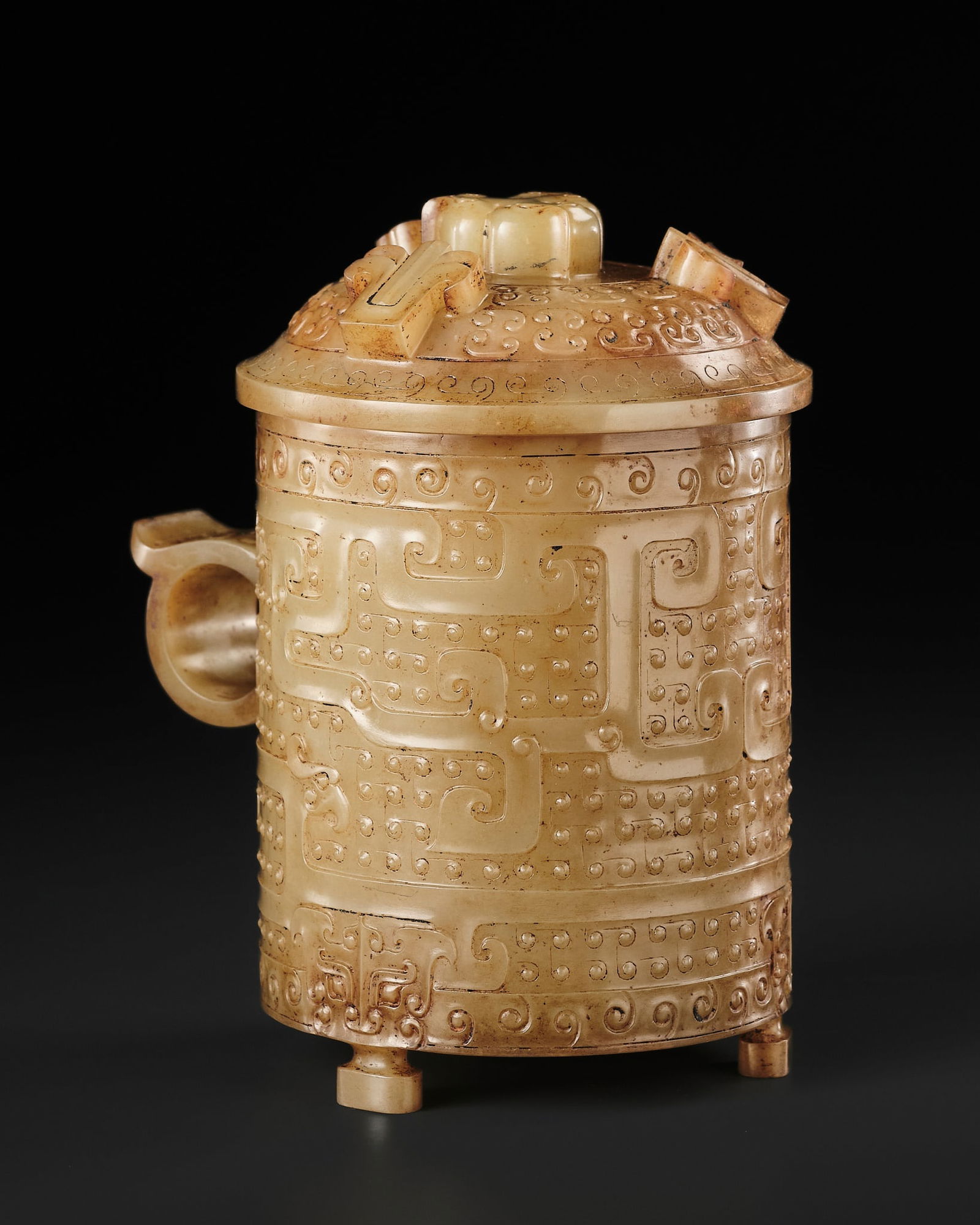 A RARE YELLOW AND RUSSET JADE 'PHOENIX' WINE CUP AND COVER, ZHI, HAN DYNASTY: A RARE YELLOW AND RUSSET JADE 'PHOENIX' WINE CUP AND COVER, ZHI, HAN DYNASTY Published: Jean-Paul Desroches (ed.) et al, The Beginning of the World. Dragons, Phoenix and Other Chimera,