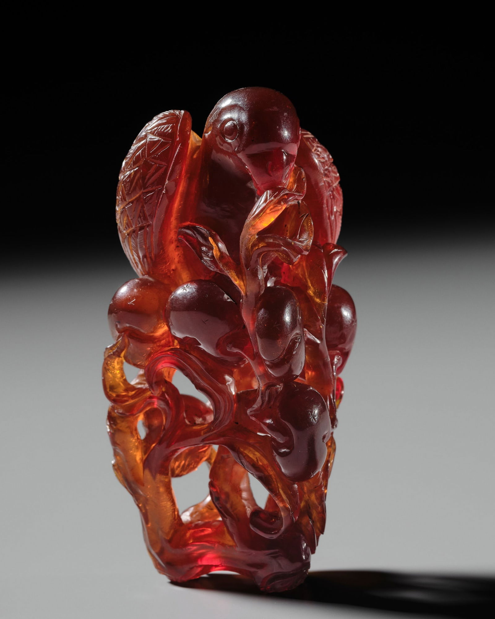 A FINE AMBER 'EAGLE AND PEACHES' PENDANT, 18TH-19TH CENTURY (1 of 15)