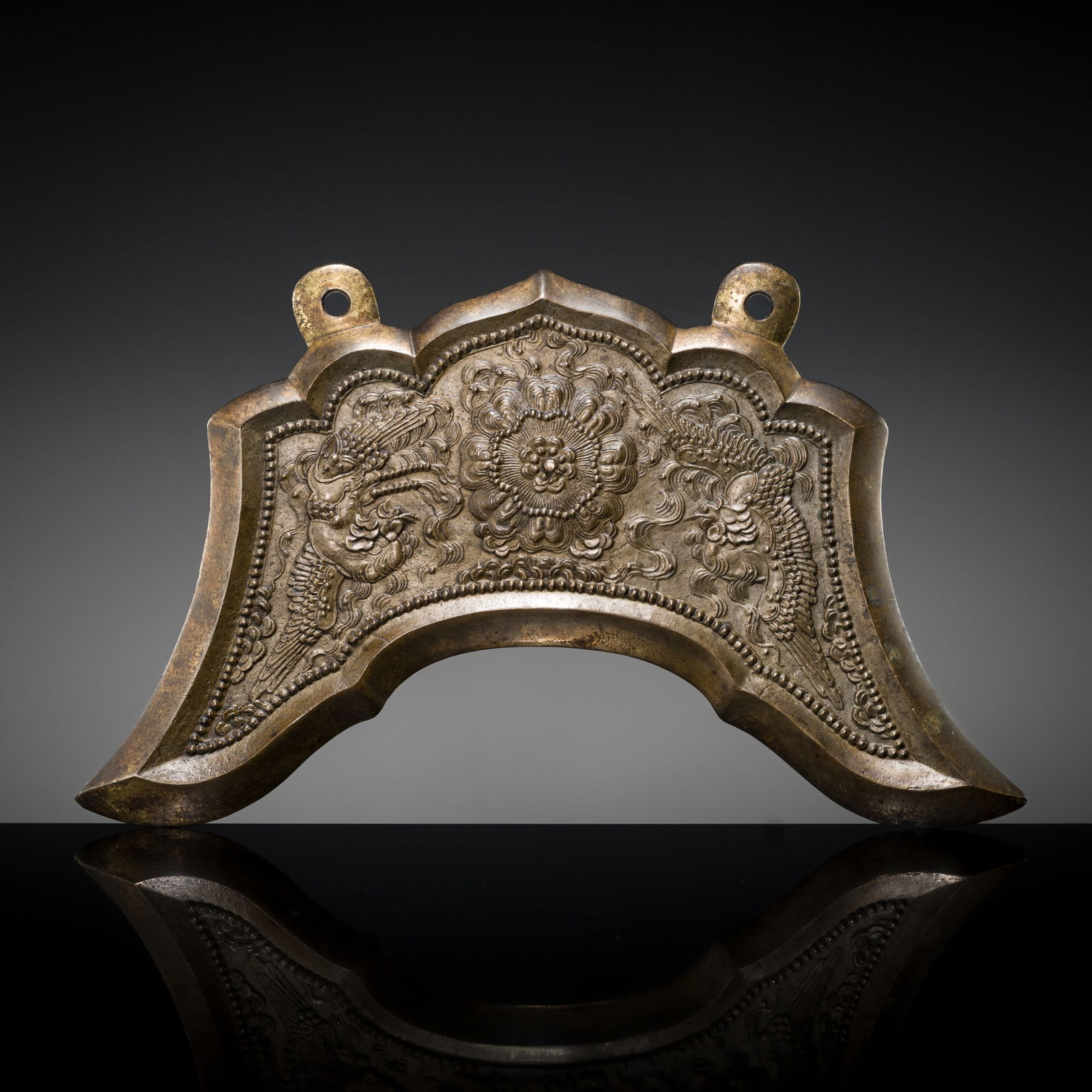 A GILT-BRONZE BUDDHIST RITUAL GONG (KEI), EDO PERIOD, 17TH CENTURY: A GILT-BRONZE BUDDHIST RITUAL GONG (KEI), EDO PERIOD, 17TH CENTURY Japan. Superbly cast of chevron-shaped form with scalloped borders flaring out at the bottom corners, neatly decorated on both sides