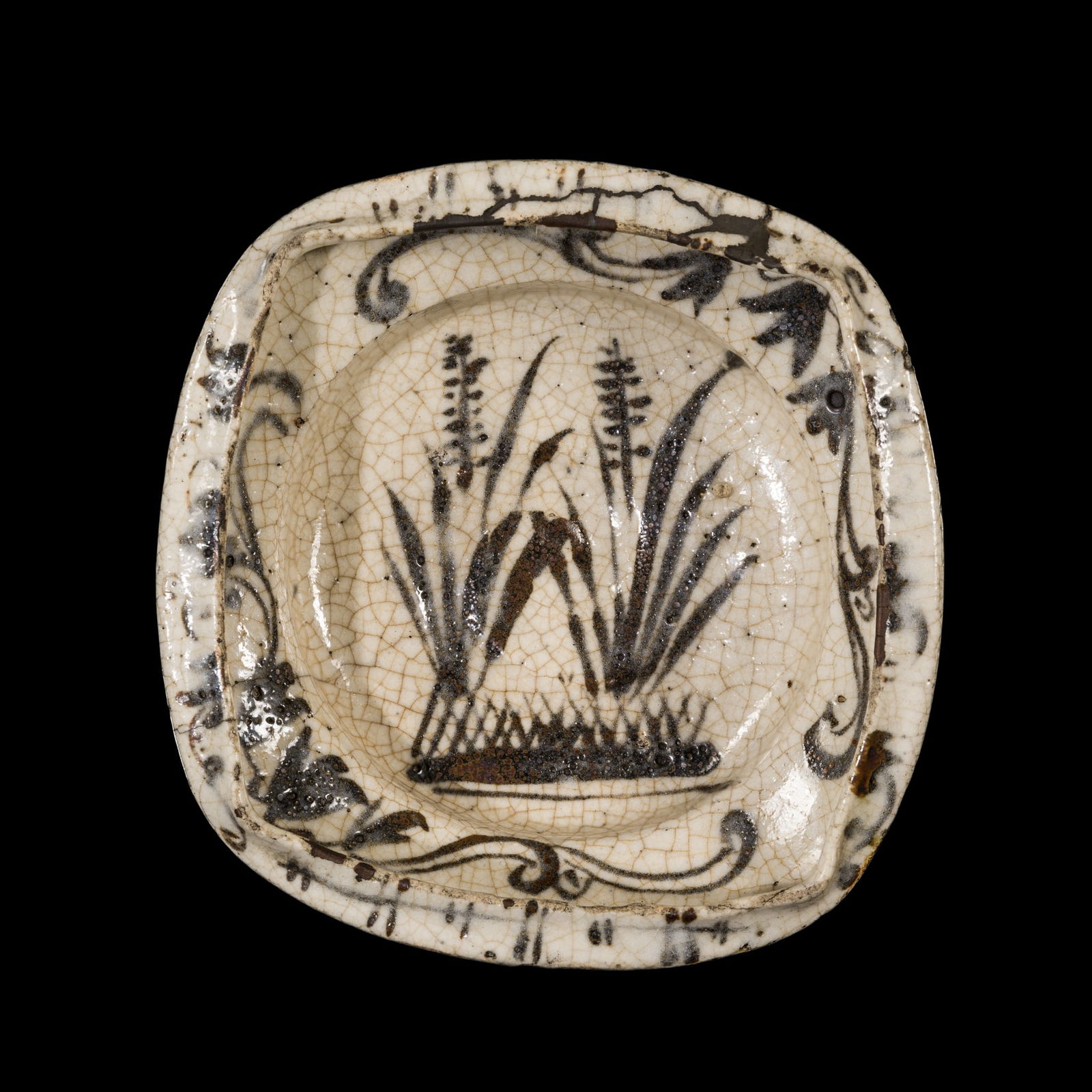 A MINO WARE SHINO GLAZED MUKOZUKE, LATE 16TH-EARLY 17TH CENTURY: A MINO WARE SHINO GLAZED MUKOZUKE, LATE 16TH-EARLY 17TH CENTURY Japan. The circular body raised on three looped feet, rising to an incurved, squared rim, covered overall in a thick creamy white glaze