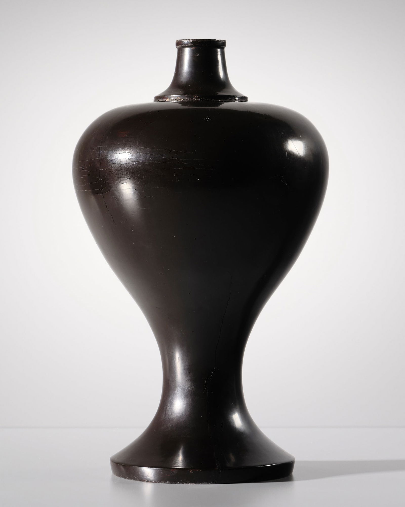 A KURO-NEGORO RITUAL SAKE FLASK, HEISHI, EARLY EDO PERIOD: A KURO-NEGORO RITUAL SAKE FLASK, HEISHI, EARLY EDO PERIOD Published: Jean-Paul Desroches (ed.) et al, Two Americans in Paris. A Quest for Asian Art, Paris, 2016, p. 232, no. 367.<