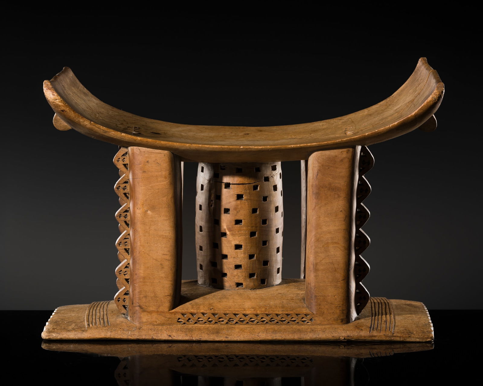 A CARVED WOOD 'CUBIST' CEREMONIAL STOOL (DWA), ASHANTI PEOPLE: A CARVED WOOD 'CUBIST' CEREMONIAL STOOL (DWA), ASHANTI PEOPLE Published: Jean-Paul Desroches (ed.) et al, Two Americans in Paris: A Quest for Asian Art, Paris, 2016, p. 160, no. 269.