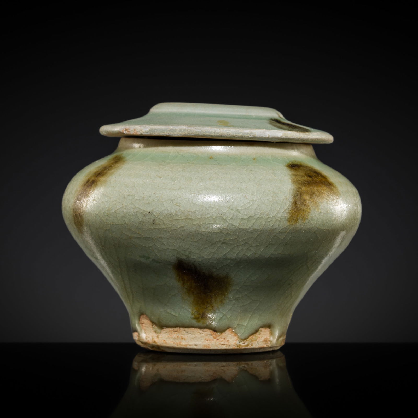 A RARE LONGQUAN CELADON-GLAZED 'TOBI SEIJI' JAR AND COVER, YUAN DYNASTY (1 of 12)