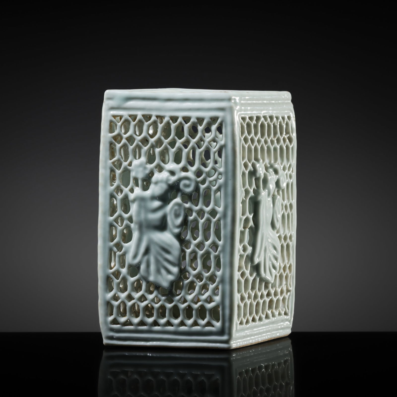 A RARE BLANC-DE-CHINE PORCELAIN RETICULATED 'HE XIANGU' LANTERN, QING DYNASTY, KANGXI TO QIANLONG: A RARE BLANC-DE-CHINE PORCELAIN RETICULATED 'HE XIANGU' LANTERN, QING DYNASTY, KANGXI TO QIANLONG PERIOD China, Jingdezhen kilns, 1662-1796. Finely potted, of rhomboidal form with straight edges, the