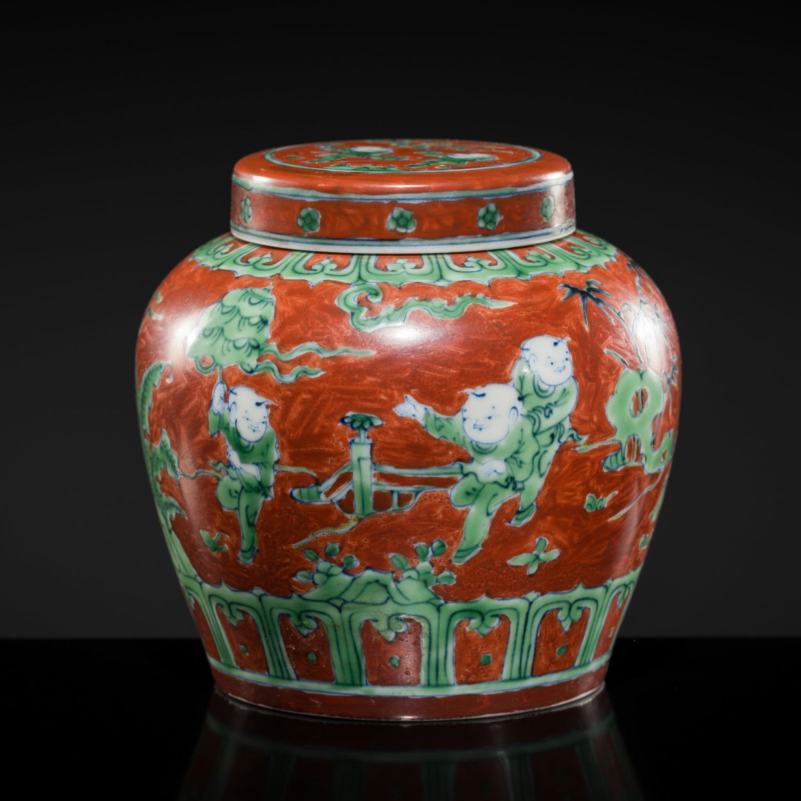 AN IRON-RED AND GREEN-GLAZED 'CHILDREN AT PLAY' VASE AND COVER (1 of 10)