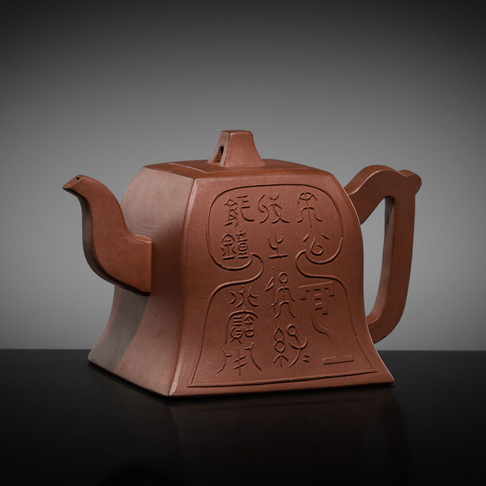 A YIXING WARE TEAPOT WITH ARCHAISTIC SCRIPT, QING DYNASTY TO REPUBLIC PERIOD (1 of 17)