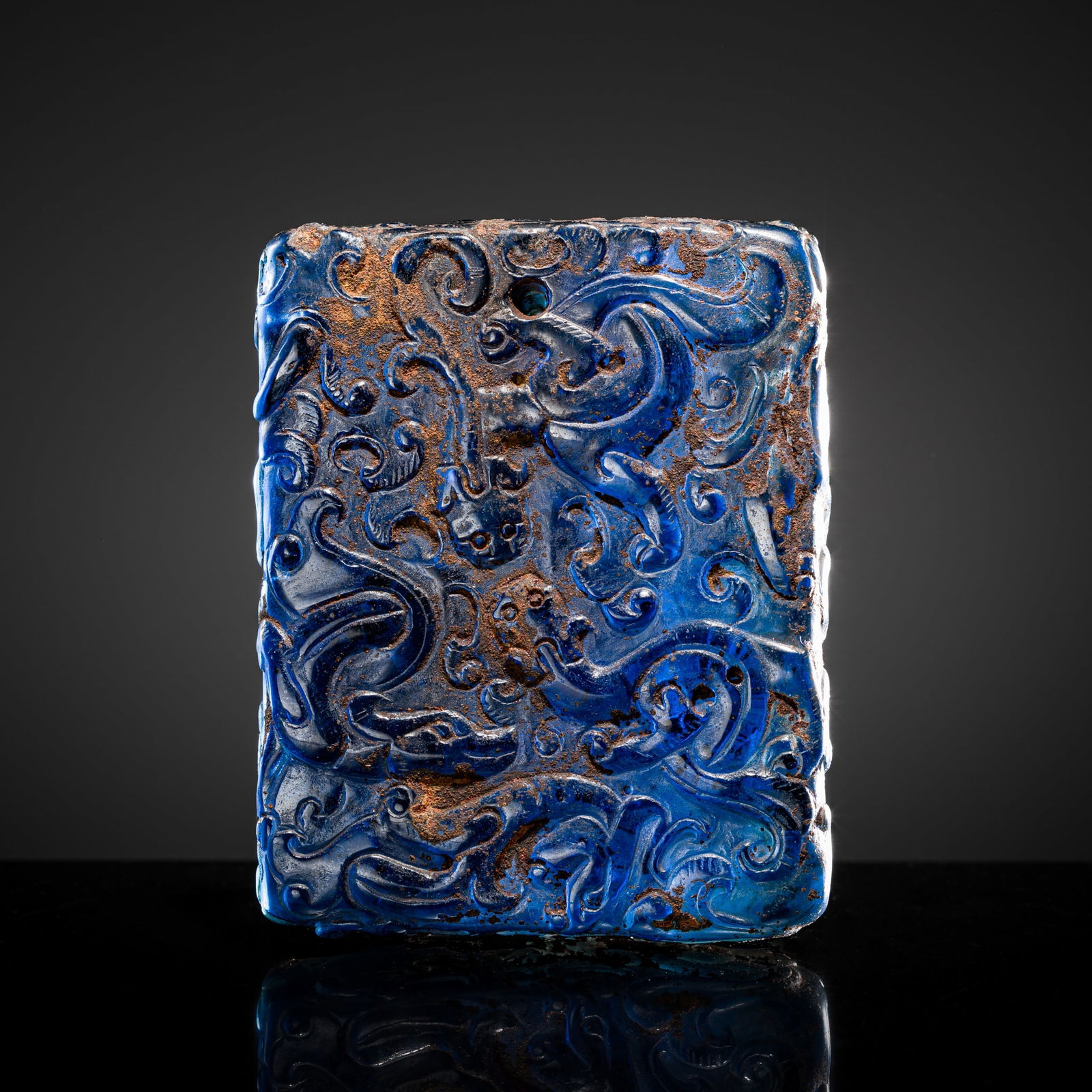 AN ARCHAIC COBALT-BLUE GLASS 'DRAGON' PLAQUE, PROBABLY HAN DYNASTY (1 of 13)