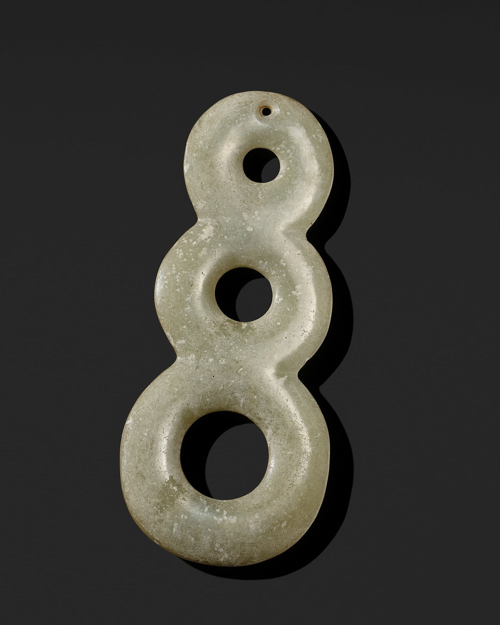 A RARE PALE CELADON JADE THREE-HOLE PENDANT, LATE NEOLITHIC PERIOD, HONGSHAN CULTURE (1 of 14)