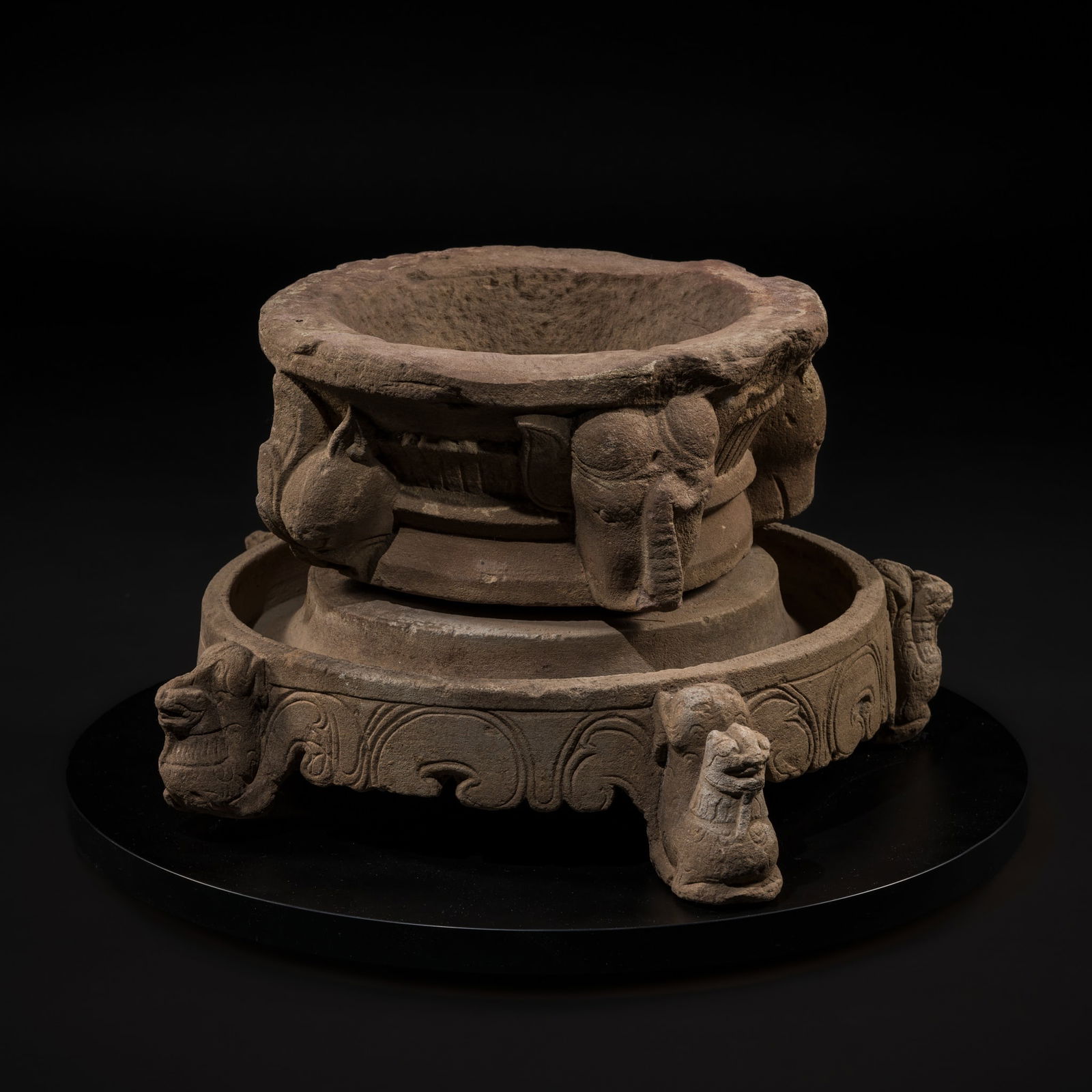 A RARE PINK SANDSTONE CEREMONIAL MORTAR, CHAM PERIOD, THAP MAM STYLE, 13TH-14TH CENTURY: A RARE PINK SANDSTONE CEREMONIAL MORTAR, CHAM PERIOD, THAP MAM STYLE, 13TH-14TH CENTURY This lot is from a single owner collection and is therefore offered without reserve Vietnam, former kingdoms of