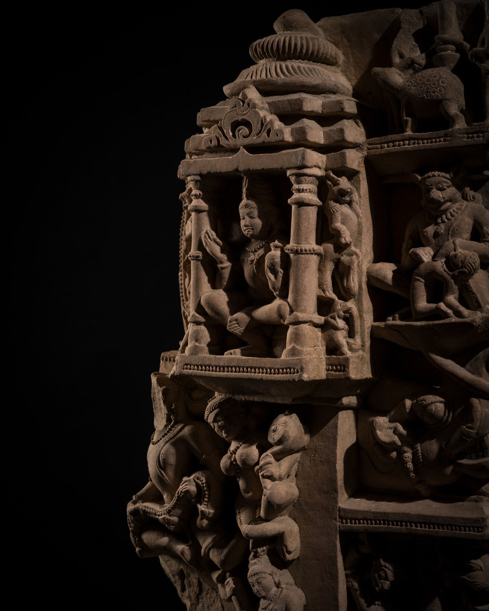 A FINELY CARVED SANDSTONE DOORJAMB, RAJASTHAN OR MADHYA PRADESH, 10TH-12TH CENTURY (1 of 17)