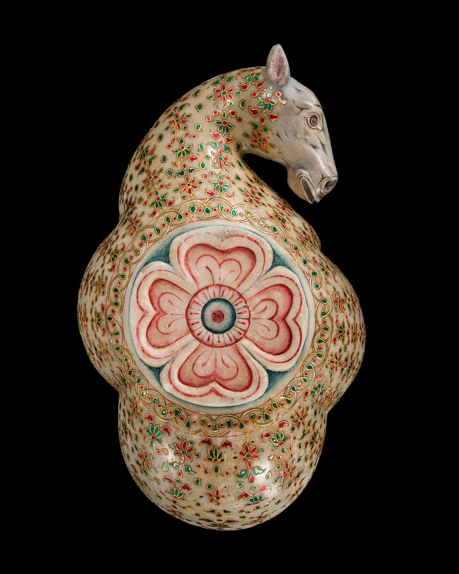 A LARGE MUGHAL-STYLE 'HORSE HEAD' MARBLE BOWL, NORTH INDIA, 19TH CENTURY: A LARGE MUGHAL-STYLE 'HORSE HEAD' MARBLE BOWL, NORTH INDIA, 19TH CENTURY This lot is from a single owner collection and is therefore offered without reserve The polylobed bowl reminiscent of a shell,