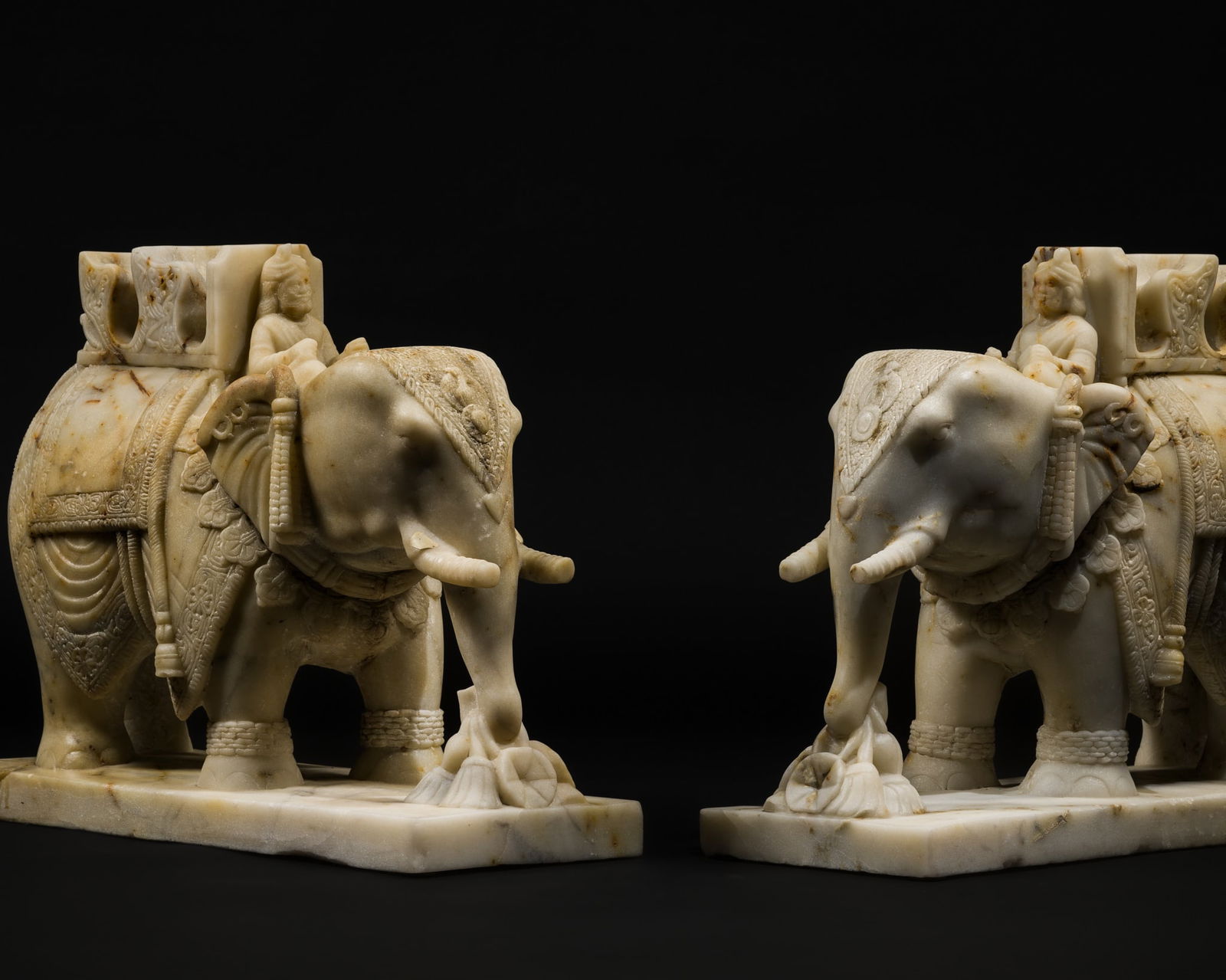 A PAIR OF FINELY CARVED WHITE MARBLE ELEPHANTS, RAJASTHAN (1 of 12)