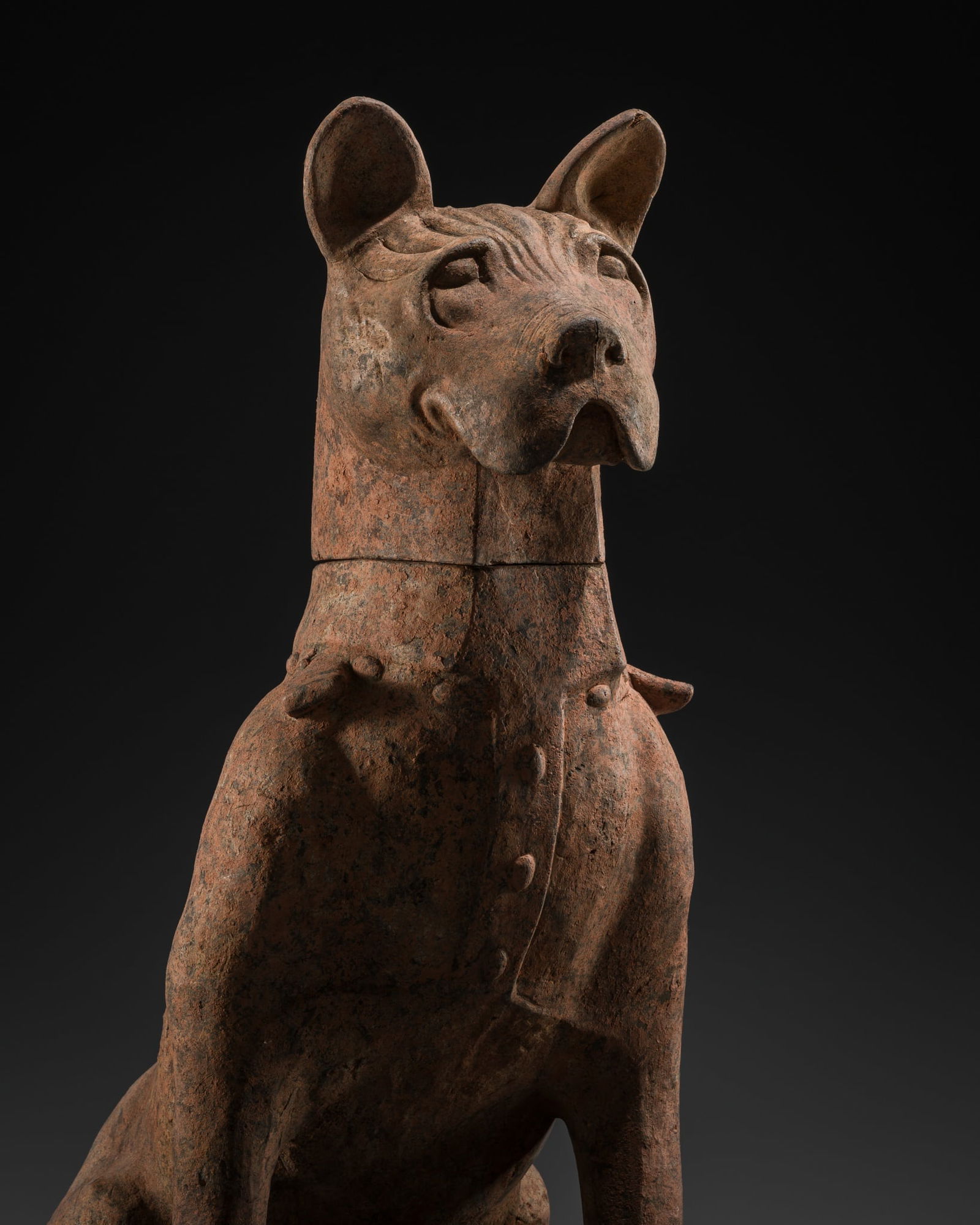 A LARGE POTTERY FIGURE OF A SEATED GUARD DOG, HAN DYNASTY (1 of 16)