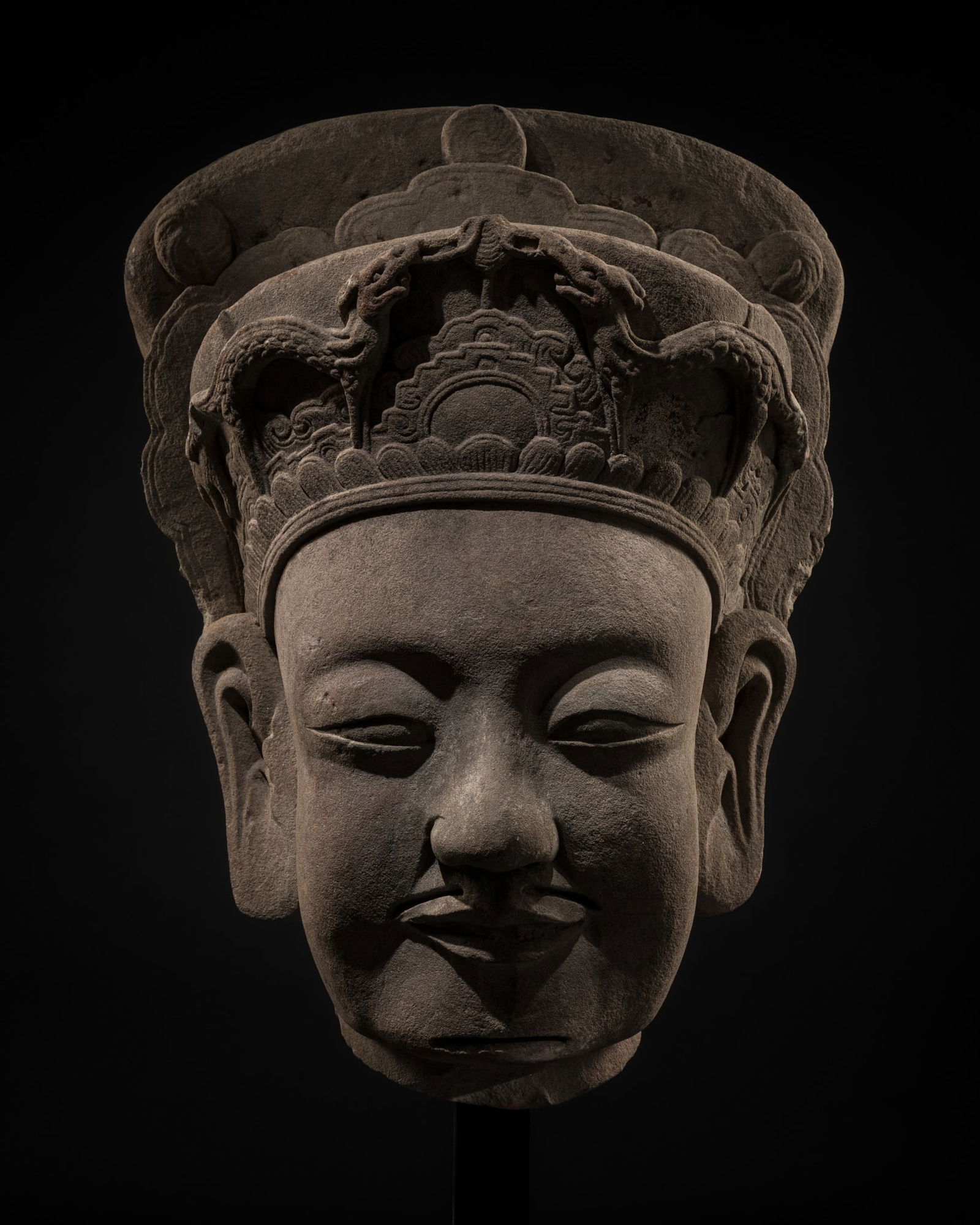 A MONUMENTAL AND IMPORTANT SANDSTONE HEAD OF A MING RULER: A MONUMENTAL AND IMPORTANT SANDSTONE HEAD OF A MING RULER This lot is from a single owner collection and is therefore offered without reserve Published: Museum der Völker (formerly Haus