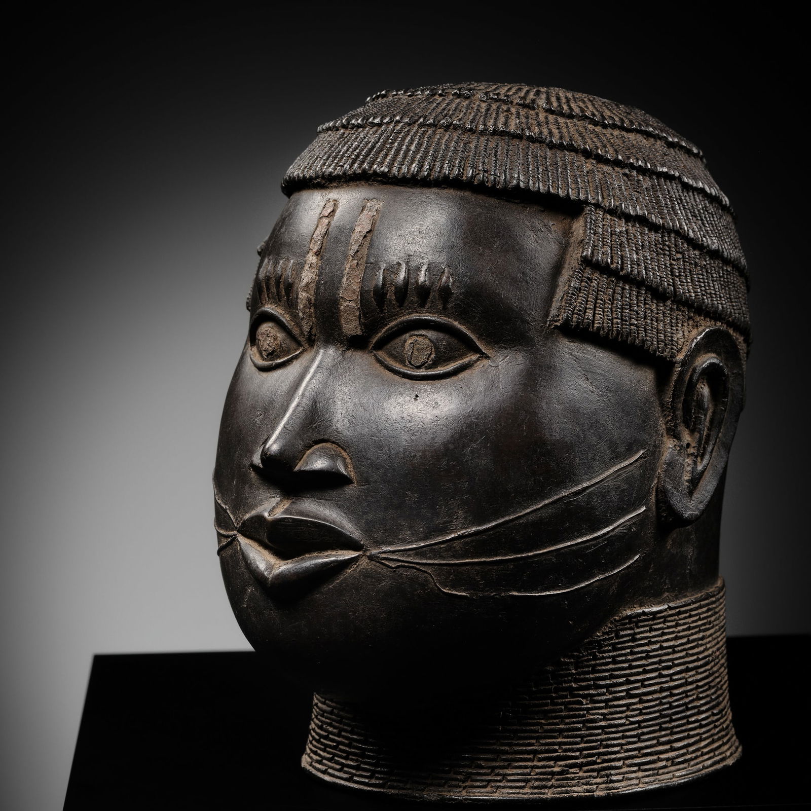 AN IRON-INLAID BRONZE TROPHY HEAD, EDO PEOPLES, 18TH-19TH CENTURY (1 of 20)