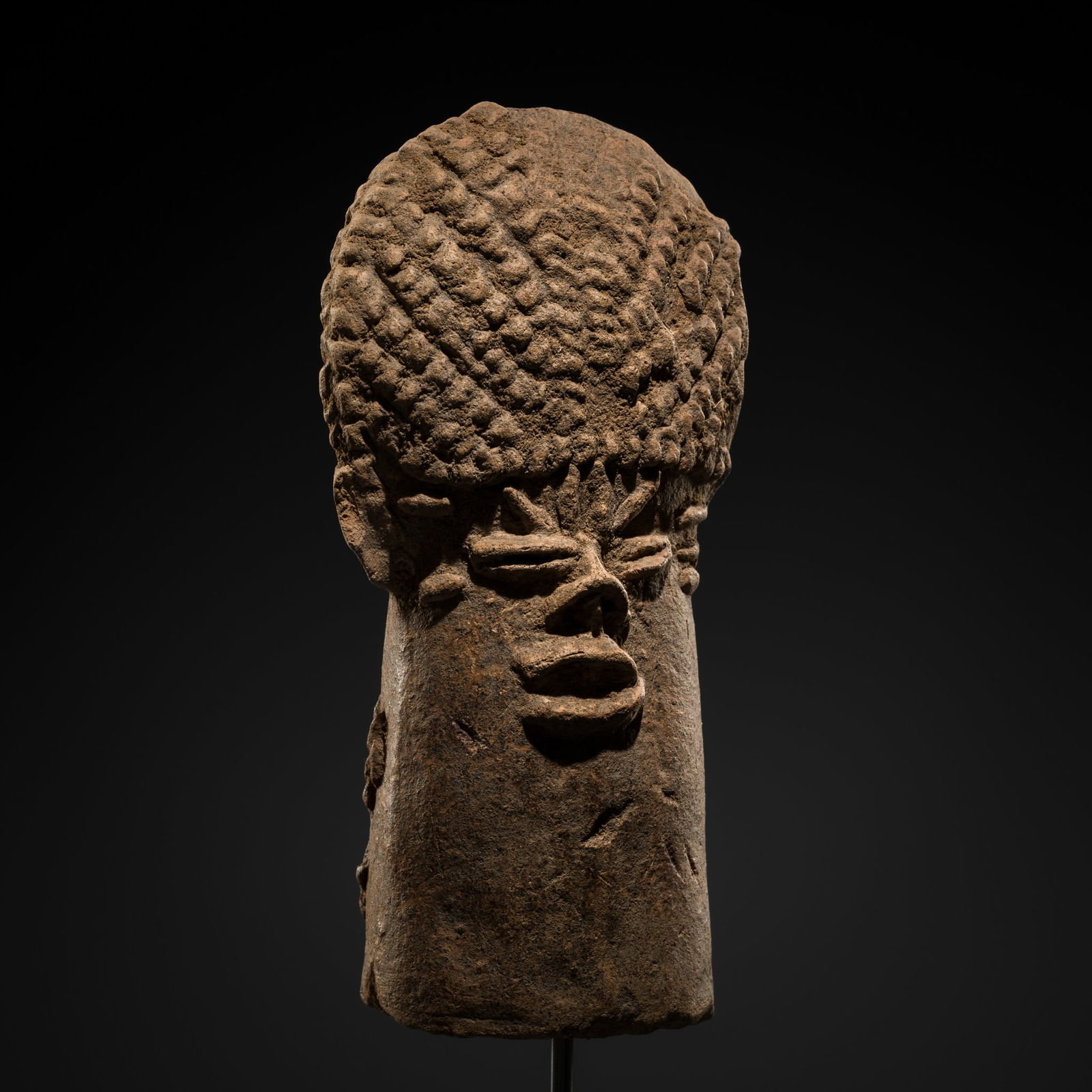 A TERRACOTTA MEMORIAL HEAD WITH TALL COIFFURE, BURA CULTURE, NIGER, 3RD-11TH CENTURY (1 of 13)