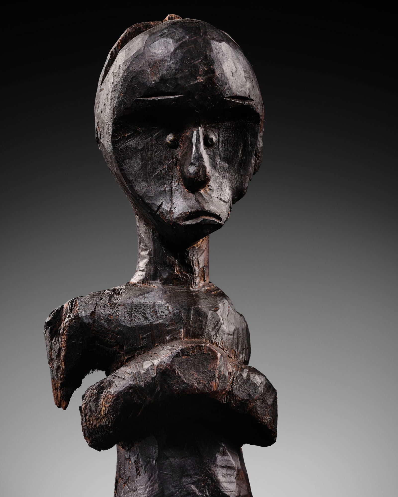 A CARVED WOOD BIERI CULT RELIQUARY FIGURE, FANG CULTURE, GABON, LATE 19TH TO MID-20TH CENTURY (1 of 20)