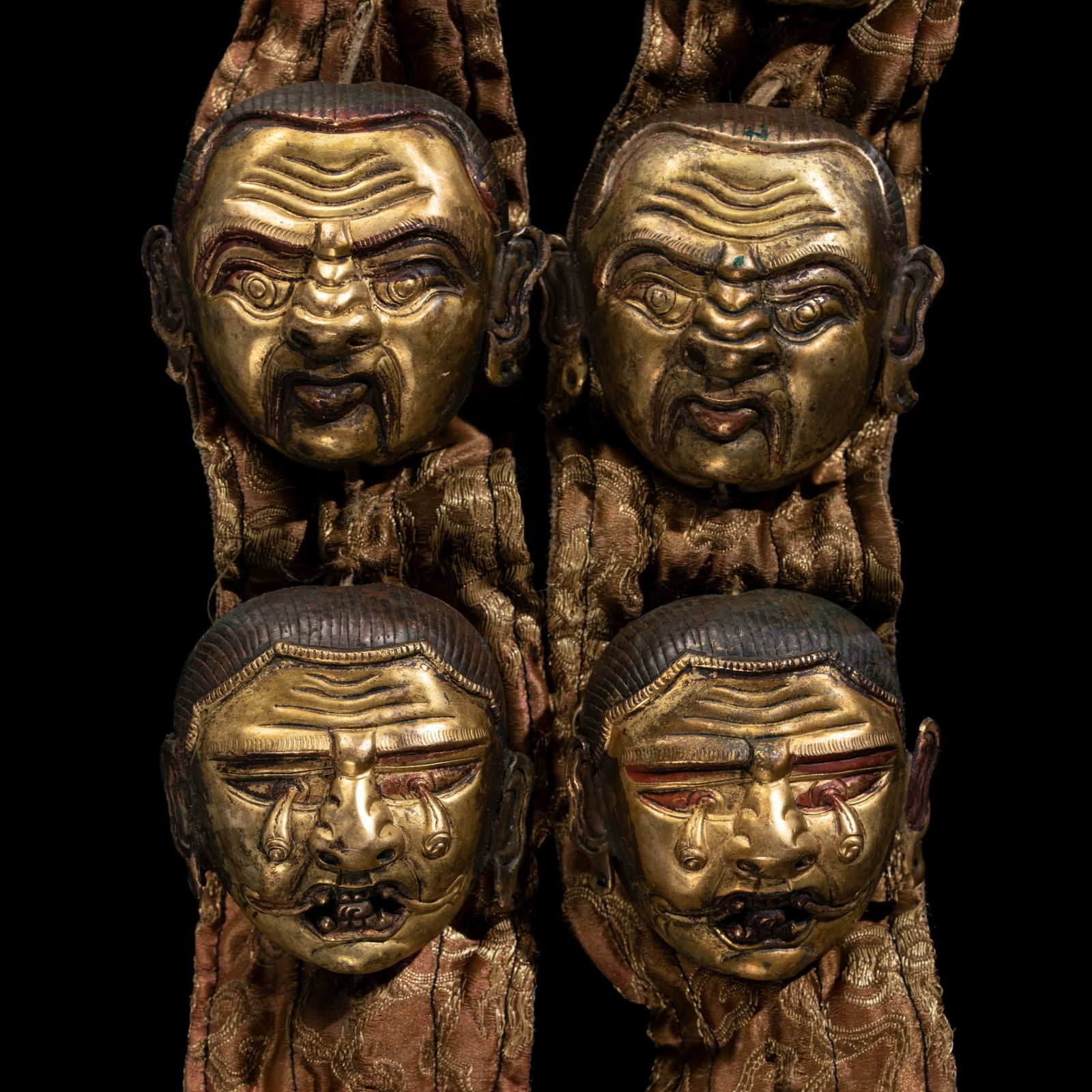A RARE SILK MUNDAMALA WITH 11 GILT COPPER ALLOY REPOUSSÉ HEADS: A RARE SILK MUNDAMALA WITH 11 GILT COPPER ALLOY REPOUSSÉ HEADS This lot is from a single owner collection and is therefore offered without reserve Tibet, mid-18th to mid-19th centur