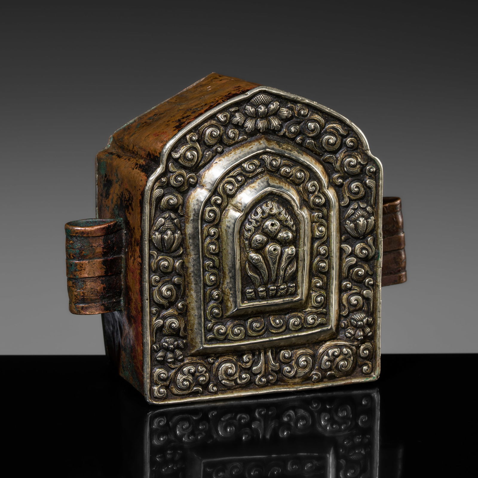 AN EMBOSSED SILVER AND COPPER PORTABLE SHRINE DEPICTING THE CINTAMANI JEWEL, GAU, 18TH-19TH CENTURY (1 of 11)