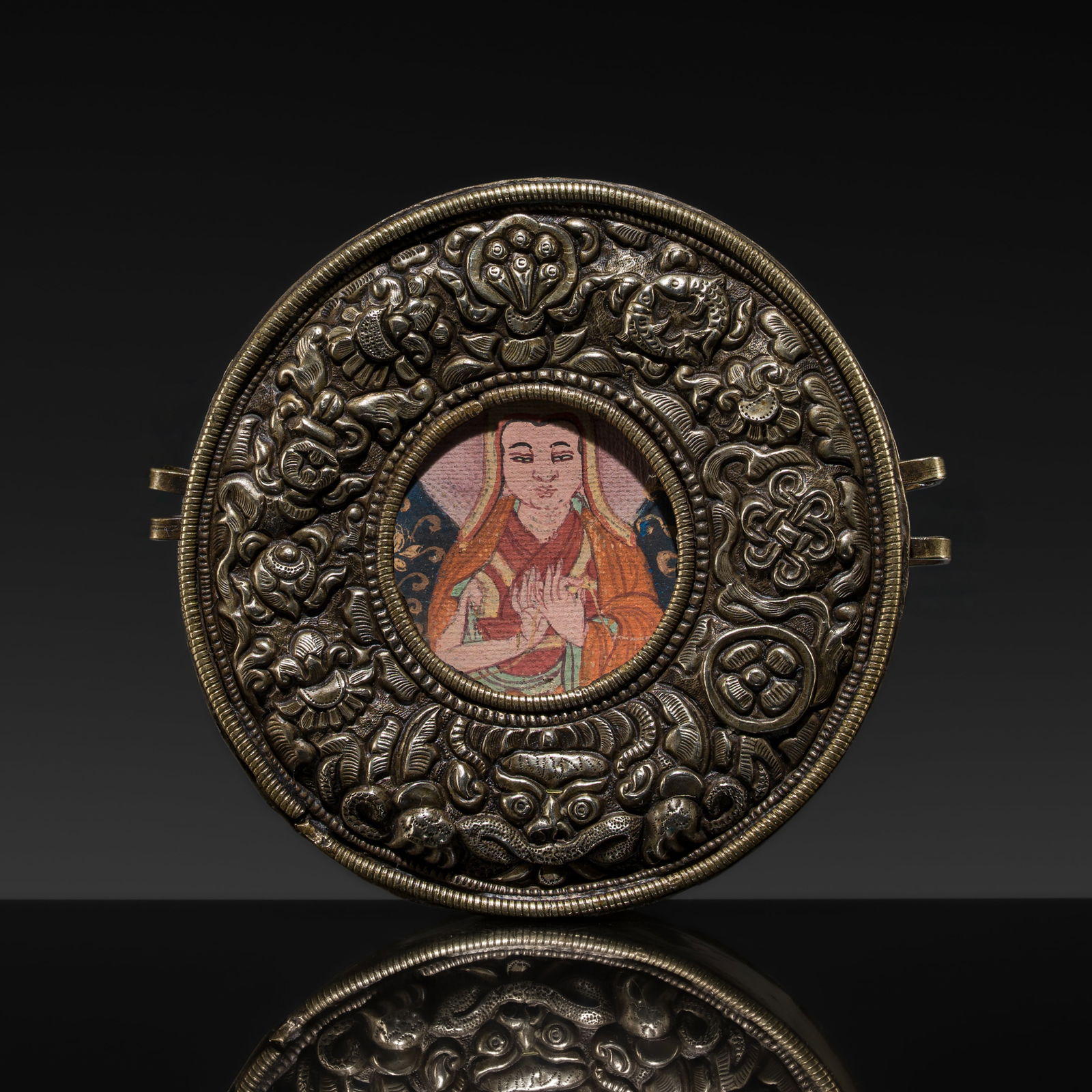 A FINE EMBOSSED METAL AND COPPER PORTABLE SHRINE WITH TSA-TSA, GAU, 19TH CENTURY (1 of 14)