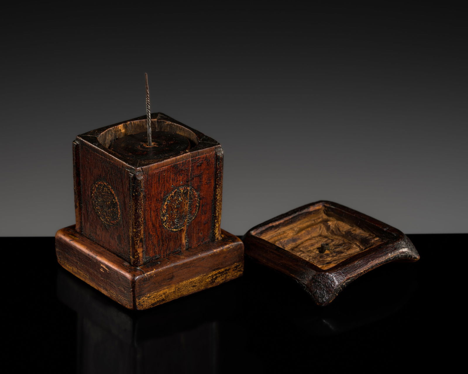 A FINELY CARVED WOOD TABLE PRAYER WHEEL, BHUTAN, 18TH-19TH CENTURY: A FINELY CARVED WOOD TABLE PRAYER WHEEL, BHUTAN, 18TH-19TH CENTURY This lot is from a single owner collection and is therefore offered without reserve The cabinet is square in plan, raised on a matchi