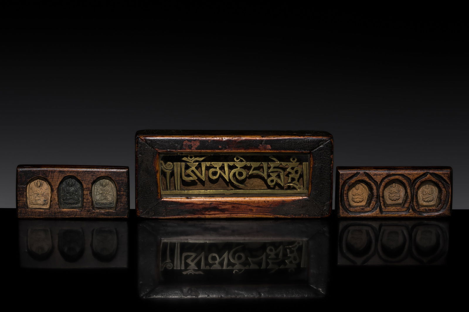 A GROUP OF TWO CLAY TSA-TSA SETS AND A BRONZE MANTRA PLAQUE, 18TH-19TH CENTURY (1 of 12)