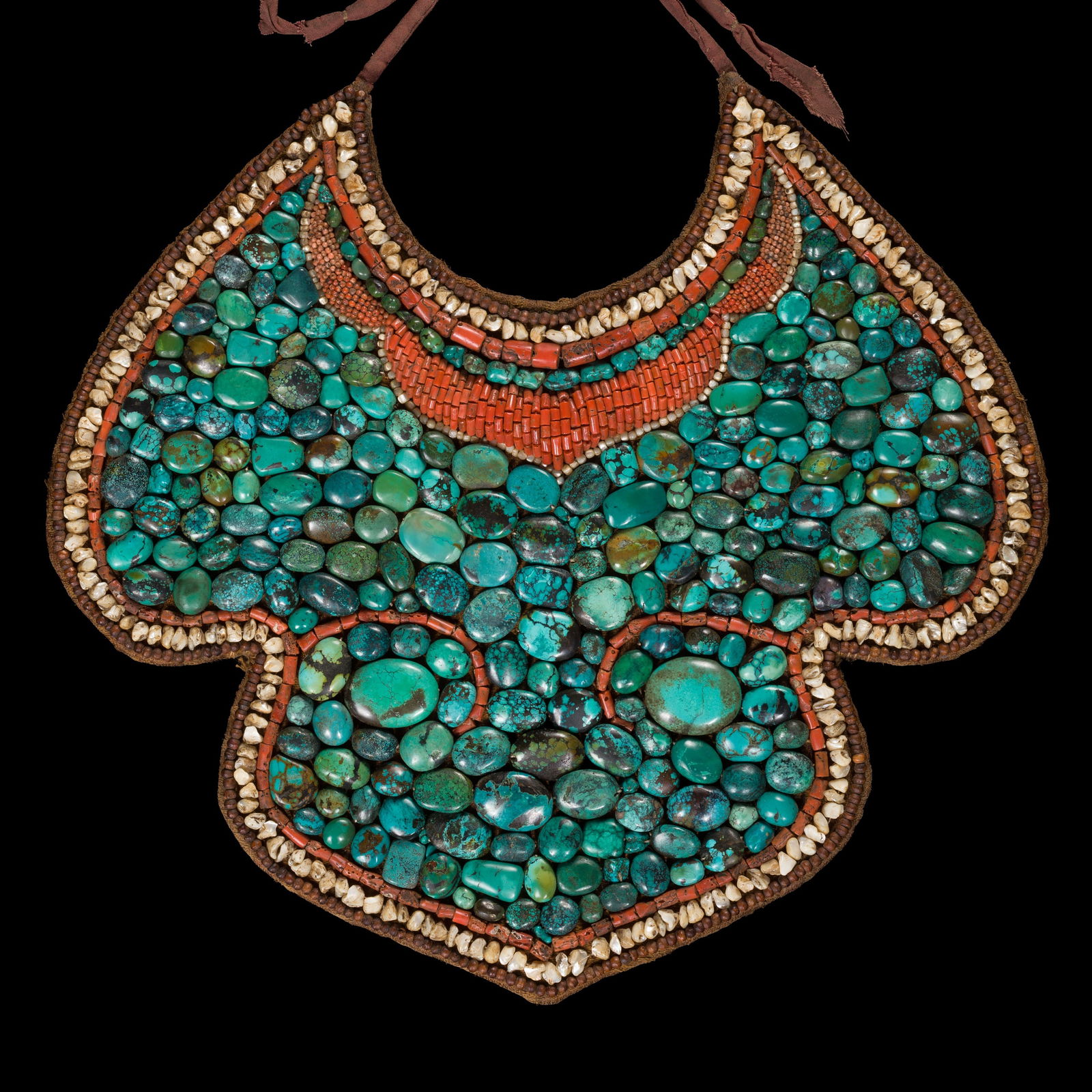 A FINE TURQUOISE, CORAL, AND SHELL PECTORAL, SKEYPUK, 19TH CENTURY: A FINE TURQUOISE, CORAL, AND SHELL PECTORAL, SKEYPUK, 19TH CENTURY This lot is from a single owner collection and is therefore offered without reserve North India, Ladakh. The crescent, lobed shaped p