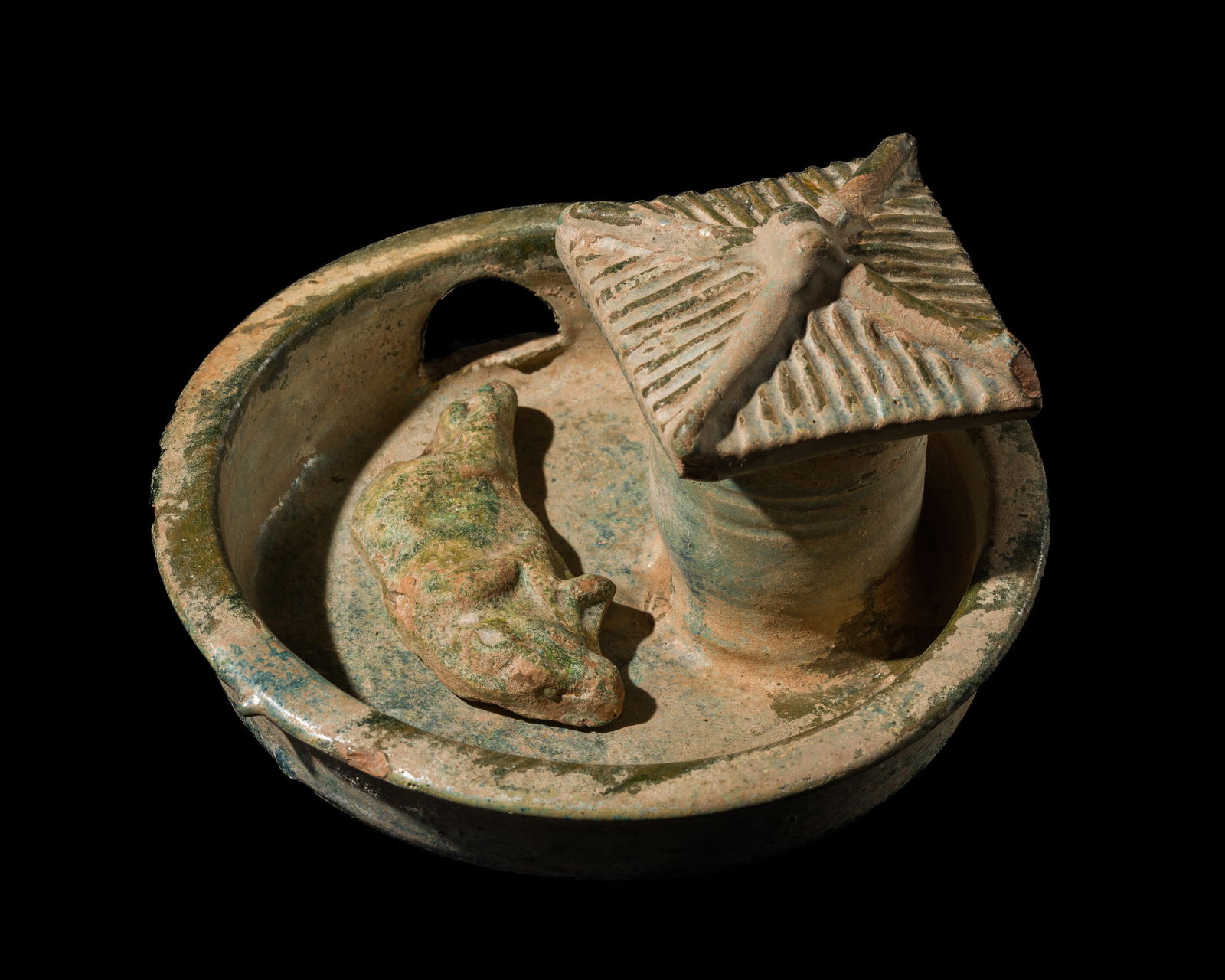A GREEN-GLAZED POTTERY MODEL OF A PIGPEN, HAN DYNASTY (1 of 15)