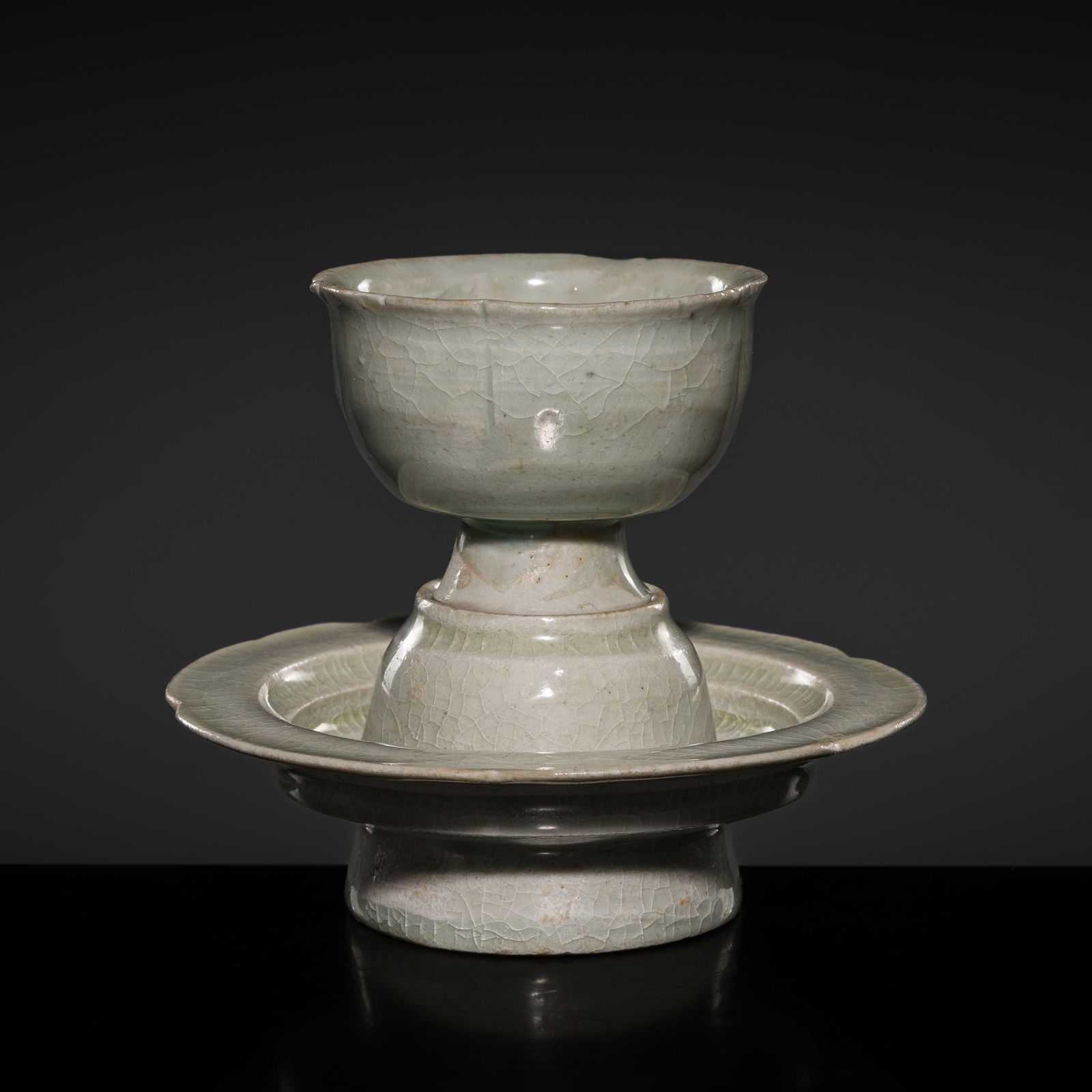 A QINGBAI LOBED CUP AND STAND, NORTHERN SONG DYNASTY (1 of 13)