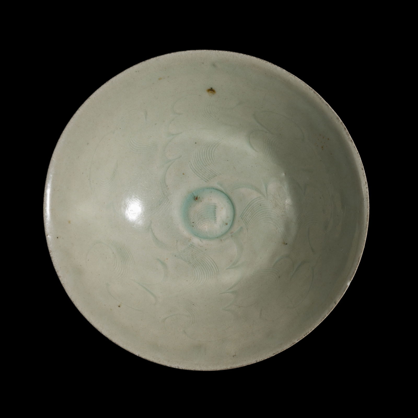 A FINELY CARVED QINGBAI 'CLOUD SCROLL' BOWL, NORTHERN SONG DYNASTY (1 of 9)
