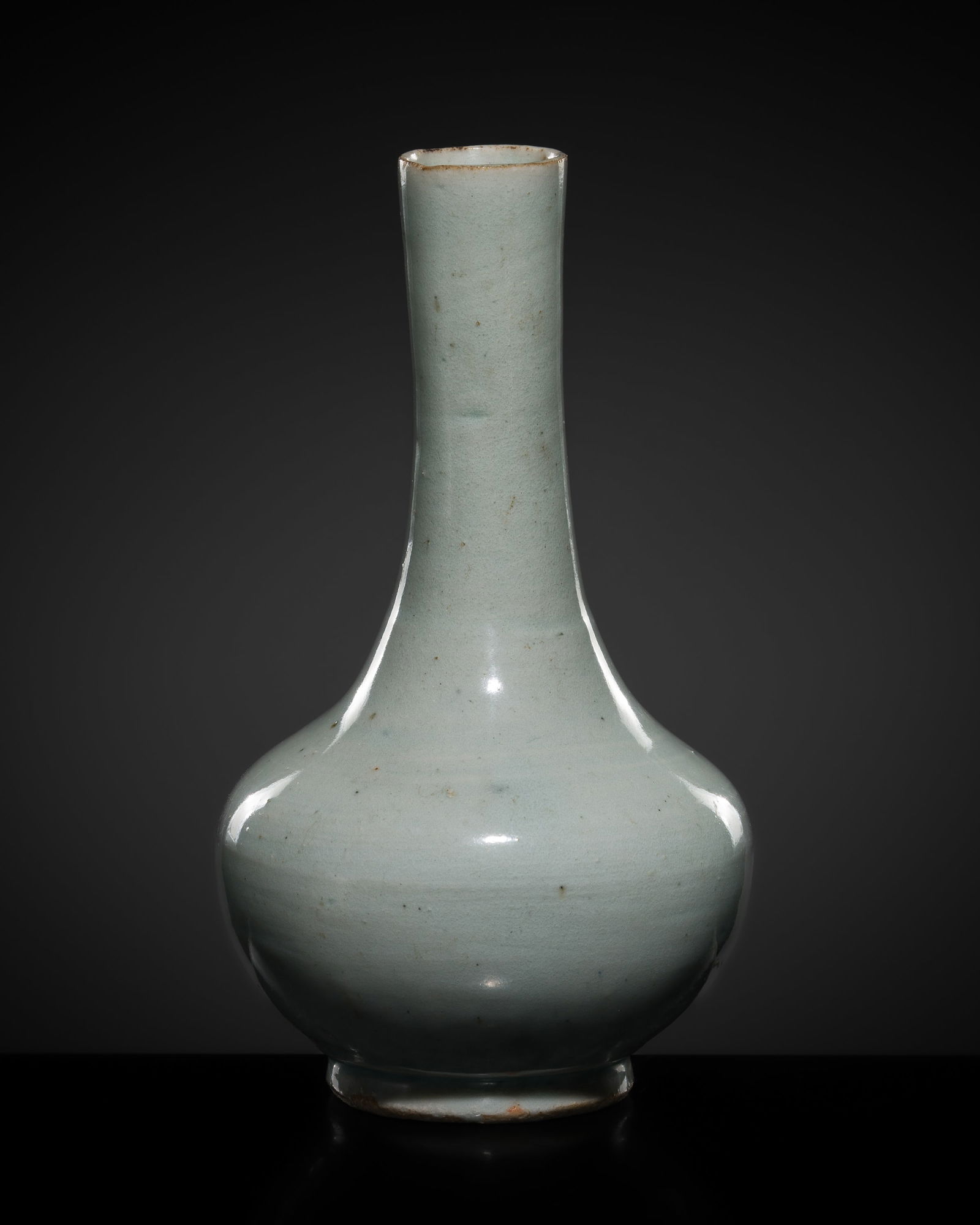 A FINE QINGBAI GLAZED PORCELAIN BOTTLE VASE, SONG DYNASTY (1 of 11)