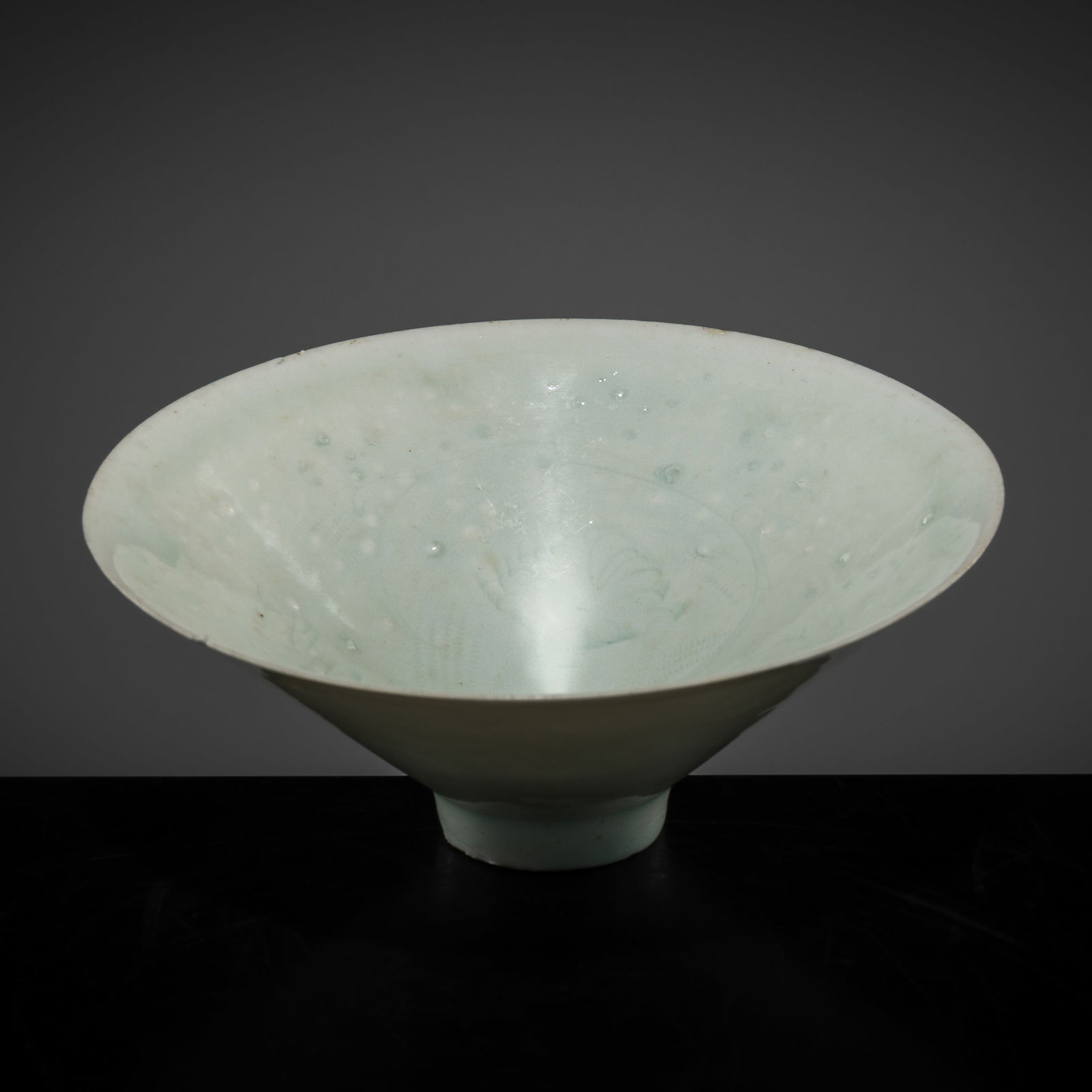 A FINELY CARVED QINGBAI 'FLORAL' BOWL, SOUTHERN SONG DYNASTY (1 of 11)