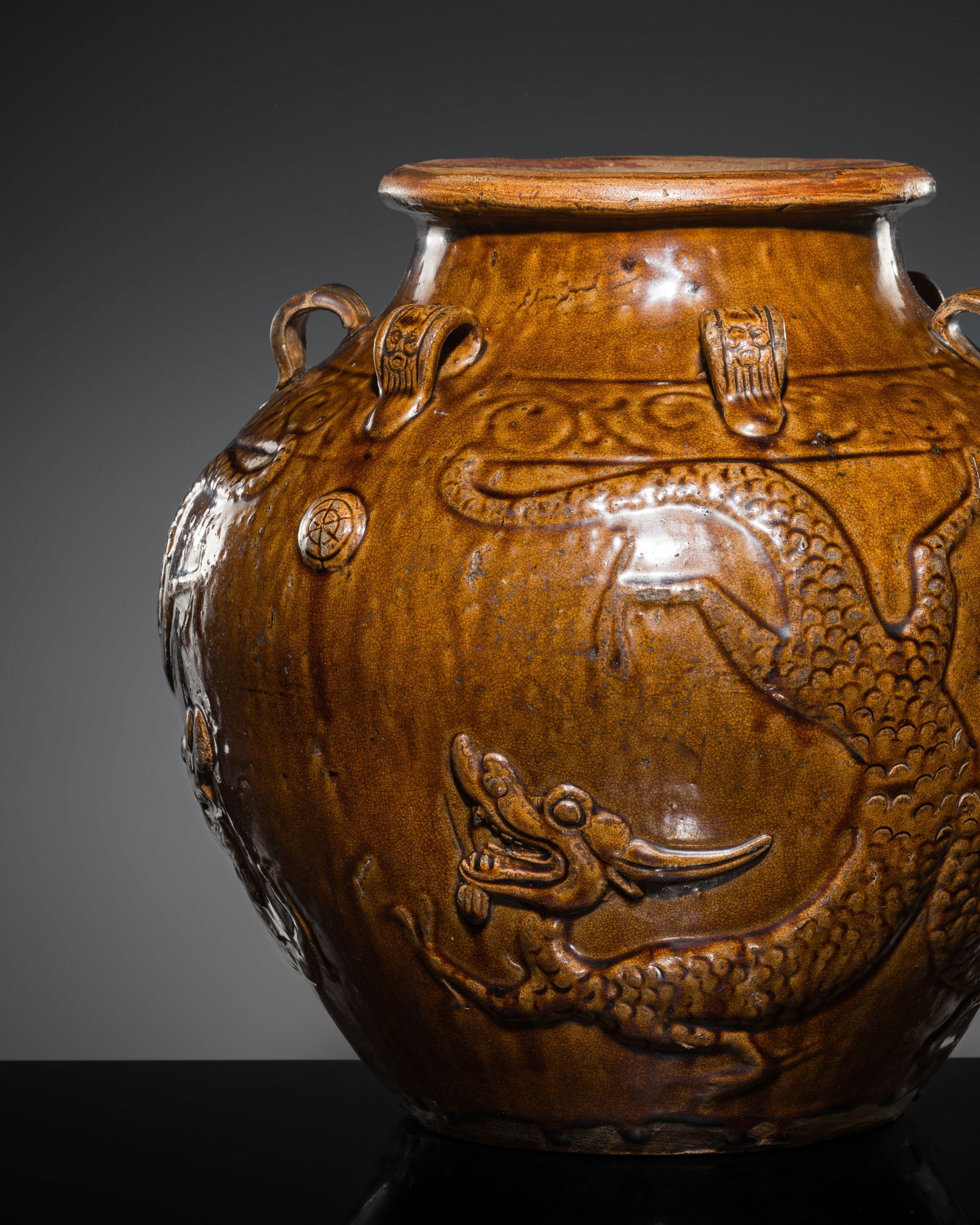 AN AMBER-GLAZED STONEWARE MARTABAN STORAGE JAR, 17TH-18TH CENTURY (1 of 15)