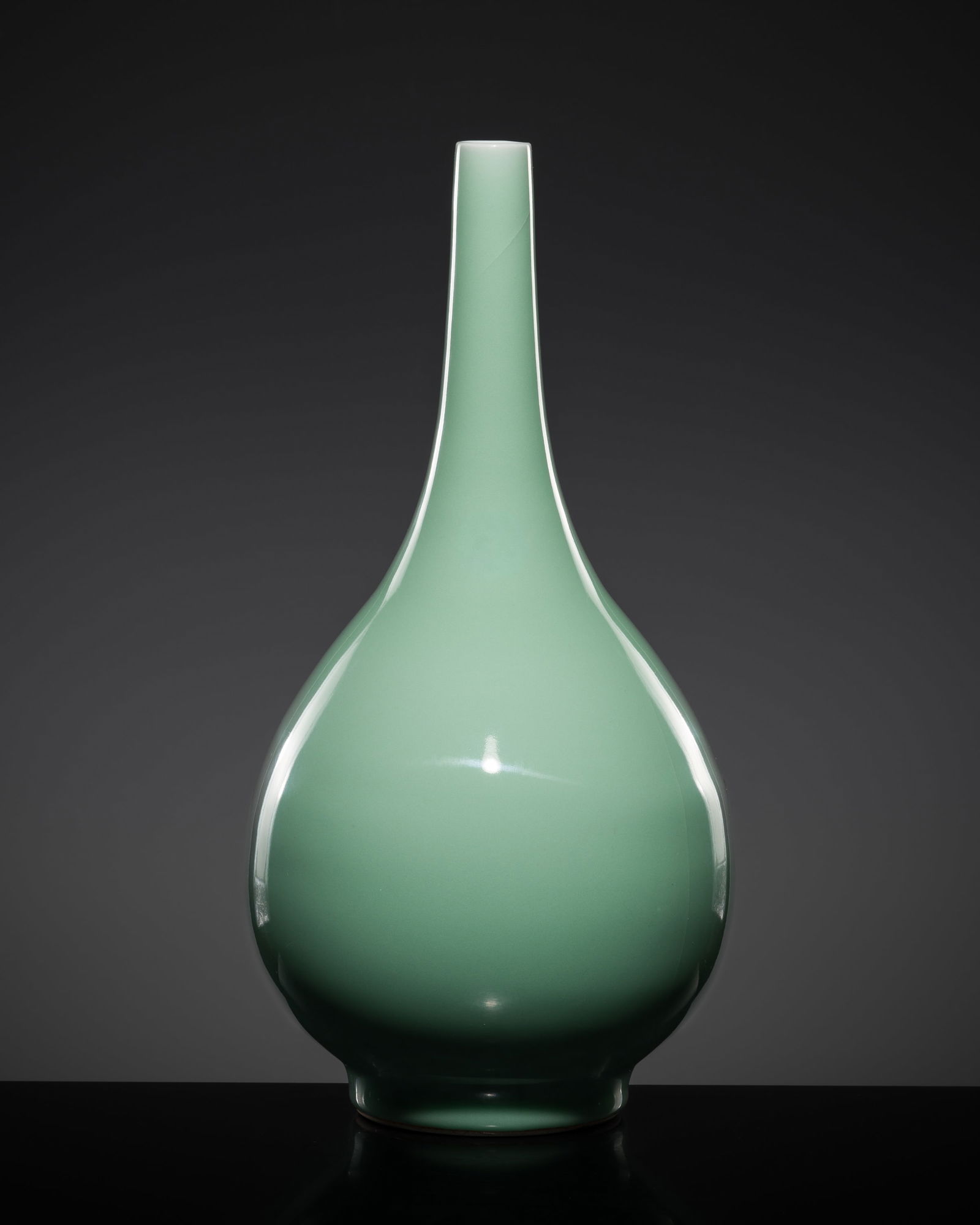 A CELADON-GLAZED BOTTLE VASE, QING DYNASTY, QIANLONG MARK AND POSSIBLY OF THE PERIOD (1 of 14)