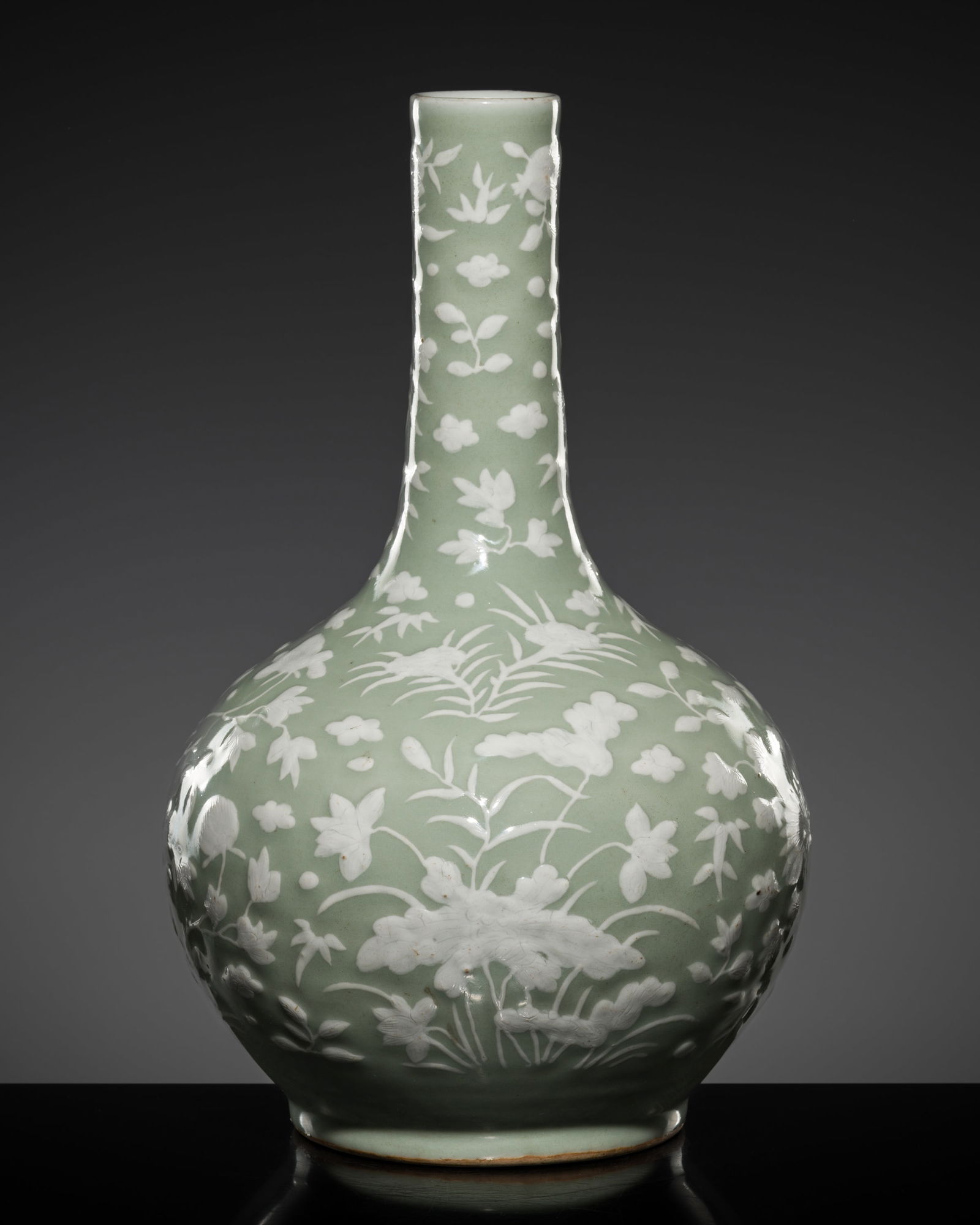 A CELADON-GROUND SLIP-DECORATED VASE, QING DYNASTY (1 of 14)