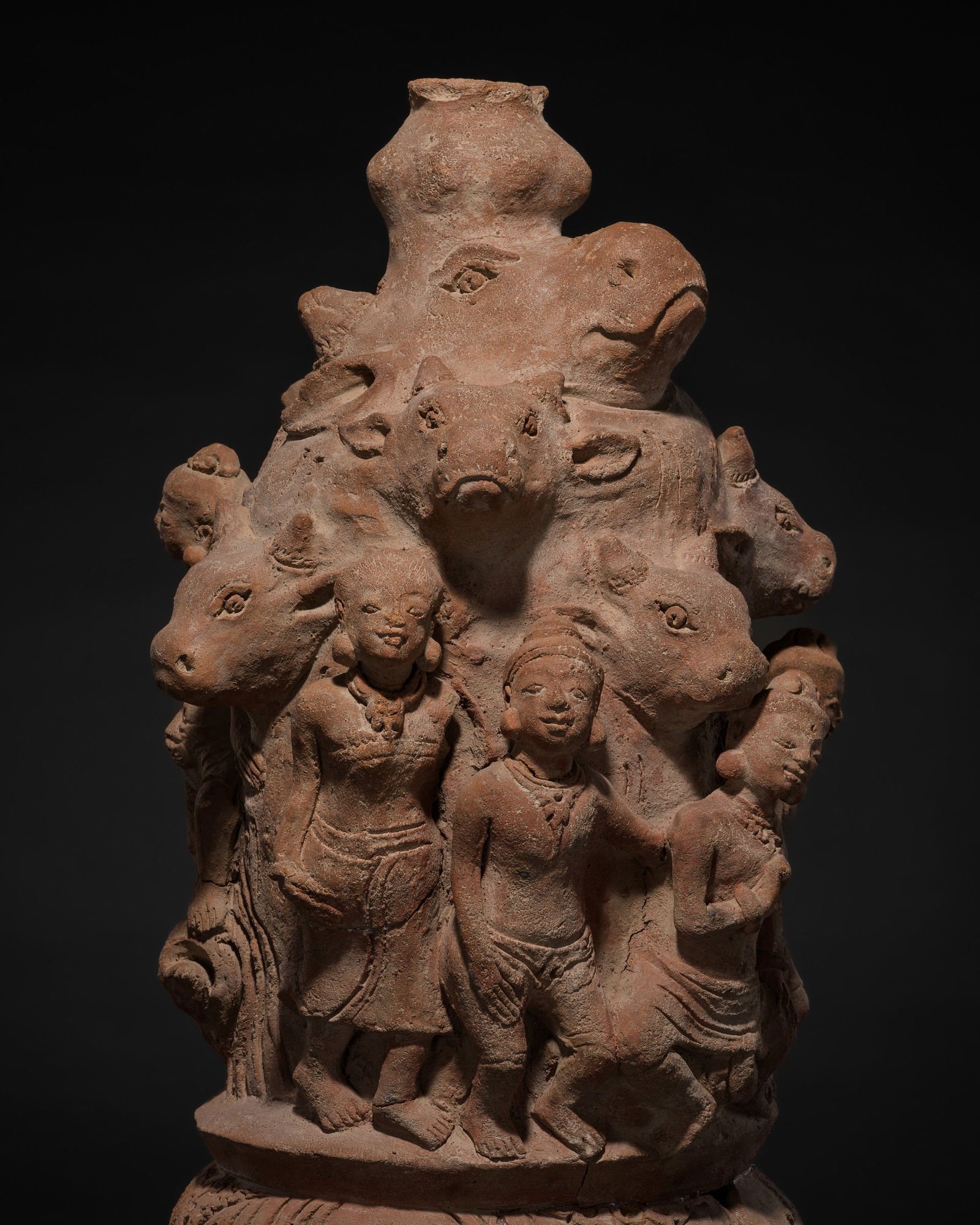A RARE MAJAPAHIT TERRACOTTA GROUP OF NANDI WORSHIPPERS (1 of 13)