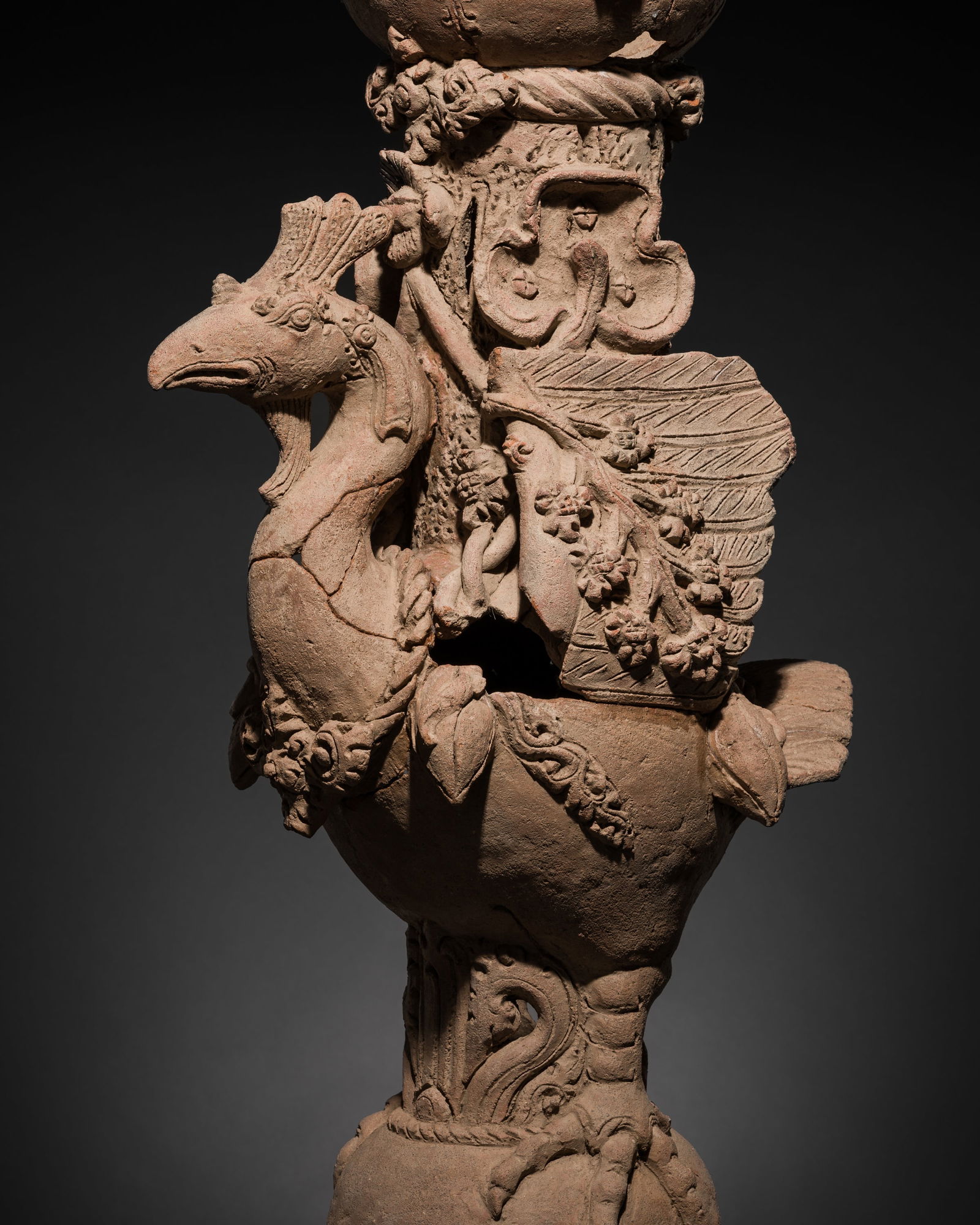A MAJAPAHIT TERRACOTTA 'PEACOCK' STAND (1 of 14)