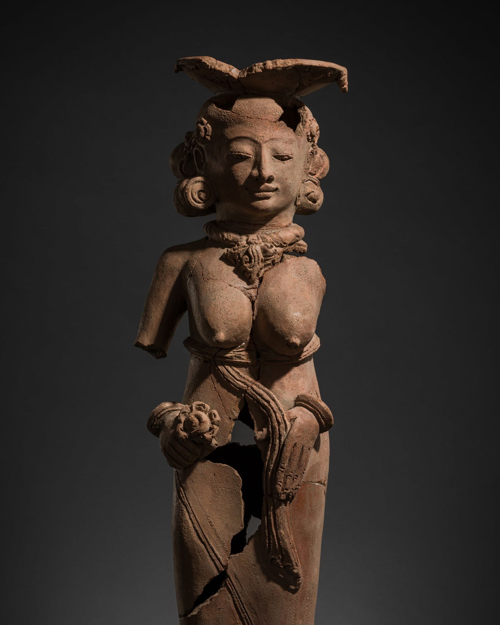 A MAJAPAHIT TERRACOTTA FIGURE OF LAKSHMI (1 of 17)