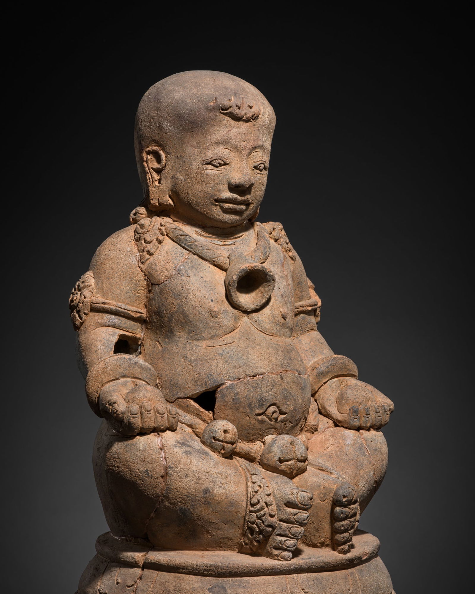 A MAJAPAHIT TERRACOTTA FIGURE OF A TODDLER (1 of 13)