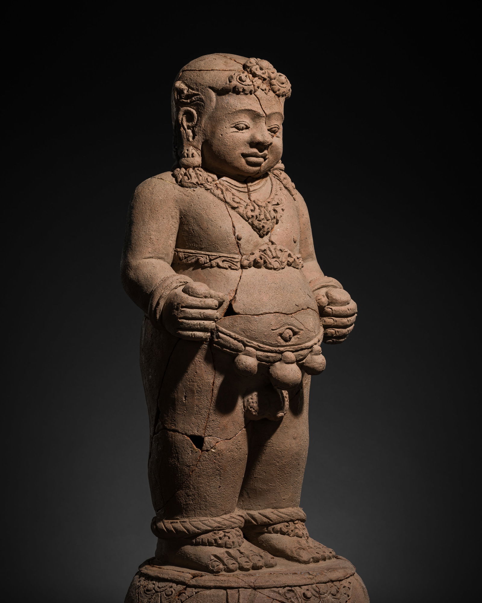 A MAJAPAHIT TERRACOTTA FIGURE OF A NOBLE BOY (1 of 12)