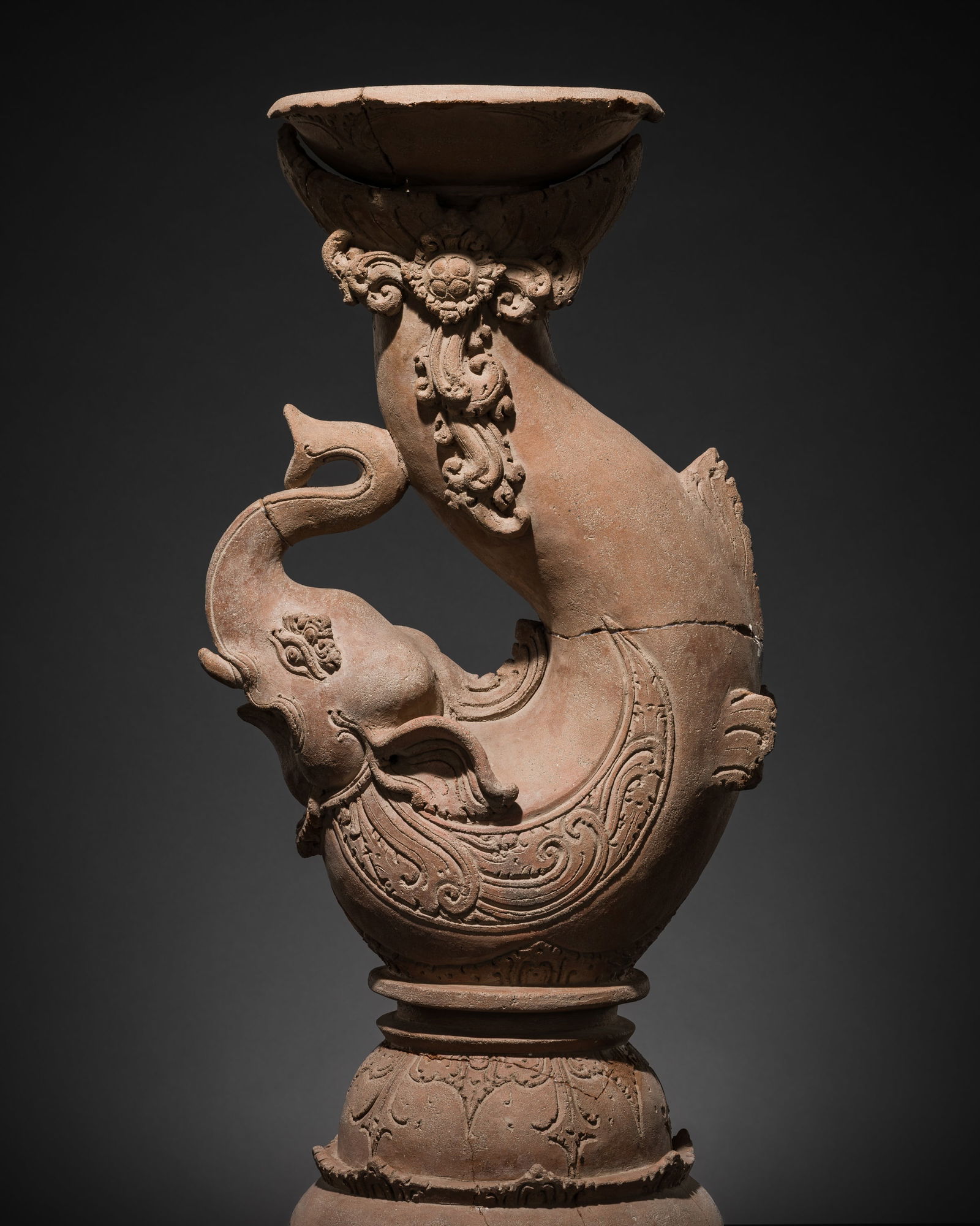 A MAJAPAHIT TERRACOTTA FIGURE OF MAKARA, GAJA-MINA: A MAJAPAHIT TERRACOTTA FIGURE OF MAKARA, GAJA-MINA This lot is from a single owner collection and is therefore offered without reserve Published: Editor Paolo Bertuzzi