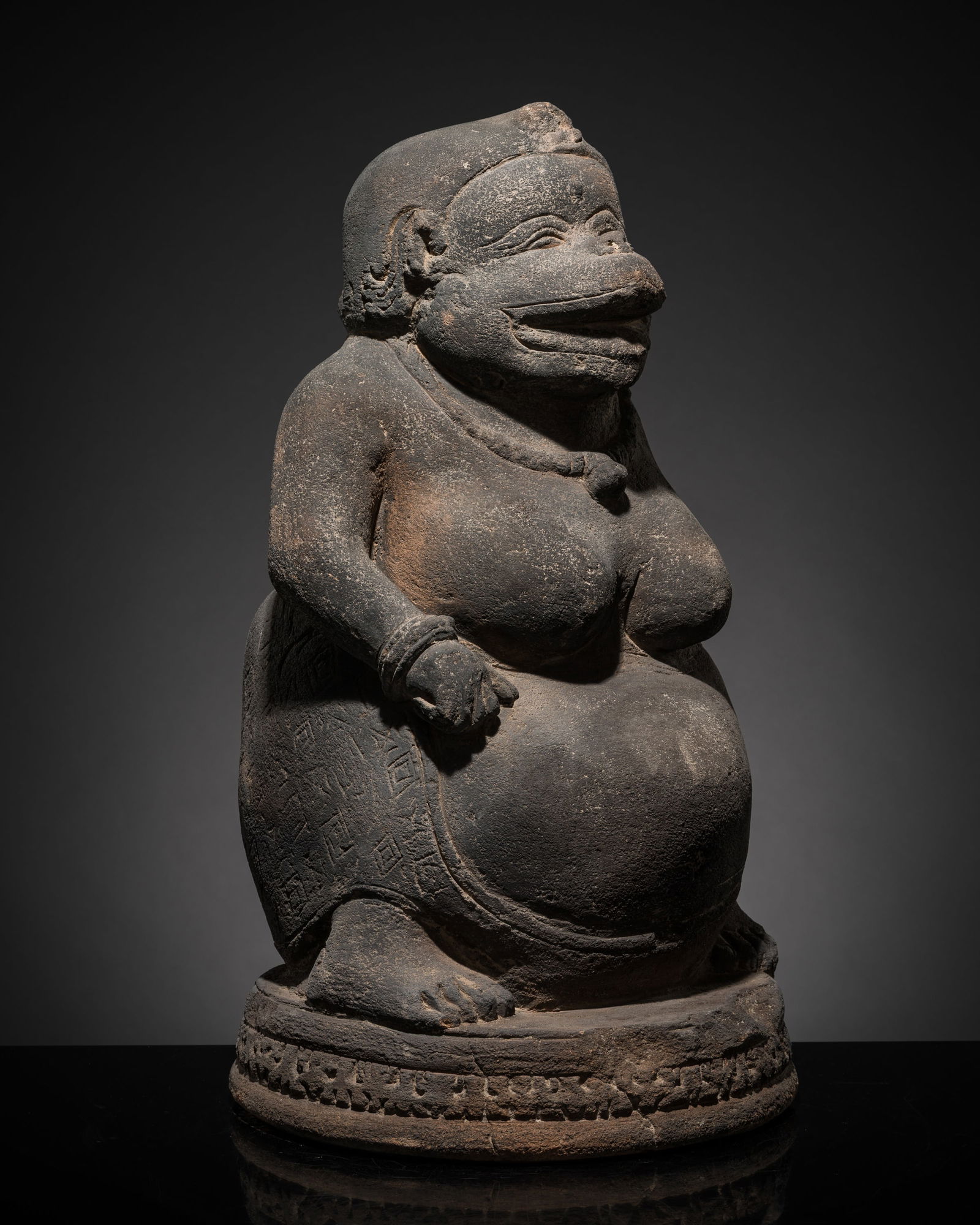 A MAJAPAHIT TERRACOTTA FIGURE OF A PUNAKAWAN, SMAR: A MAJAPAHIT TERRACOTTA FIGURE OF A PUNAKAWAN, SMAR This lot is from a single owner collection and is therefore offered without reserve Published: Editor Paolo Bertuzzi
