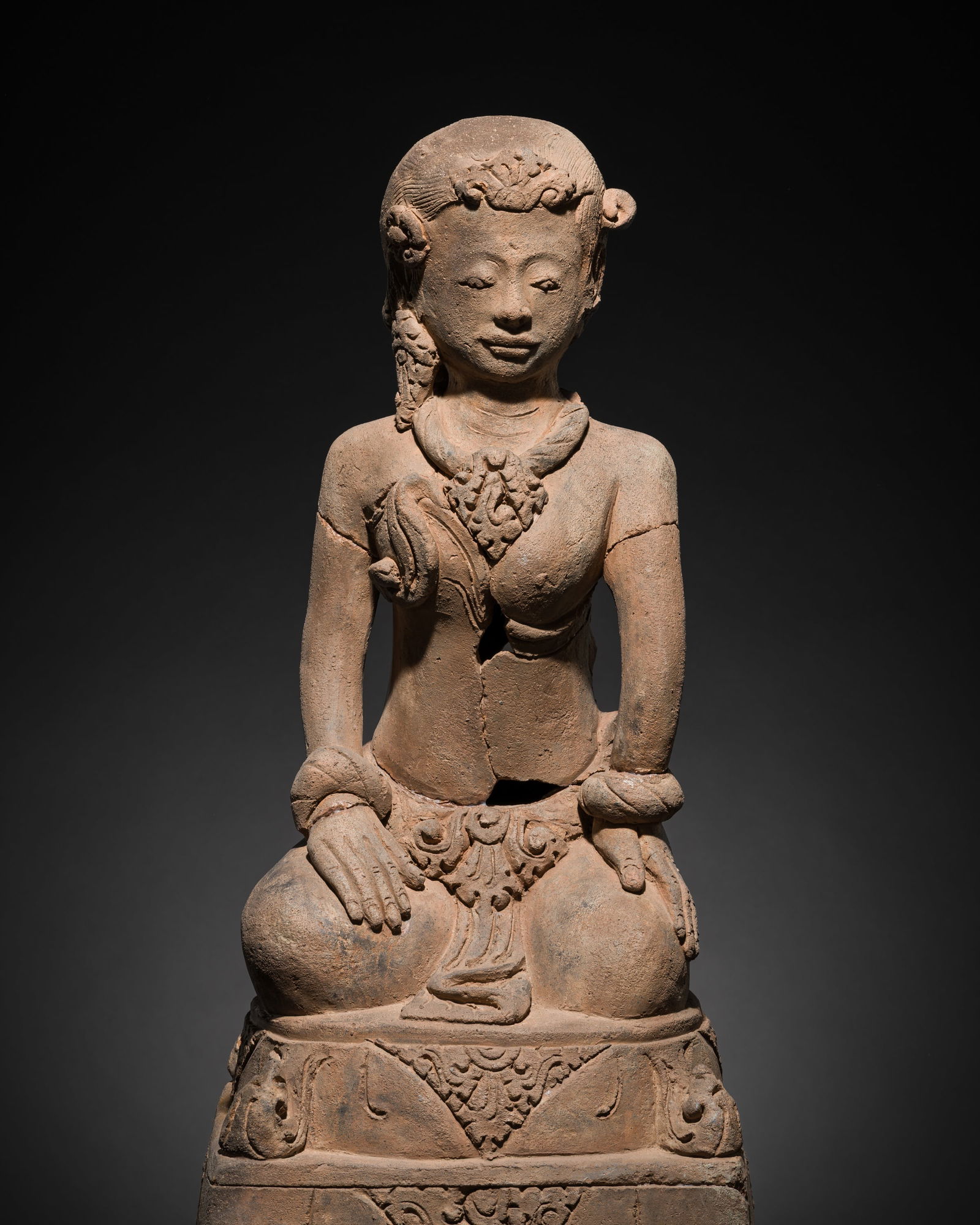 A MAJAPAHIT TERRACOTTA FIGURE OF A YOUNG GIRL: A MAJAPAHIT TERRACOTTA FIGURE OF A YOUNG GIRL This lot is from a single owner collection and is therefore offered without reserve Published: Editor Paolo Bertuzzi; Aut