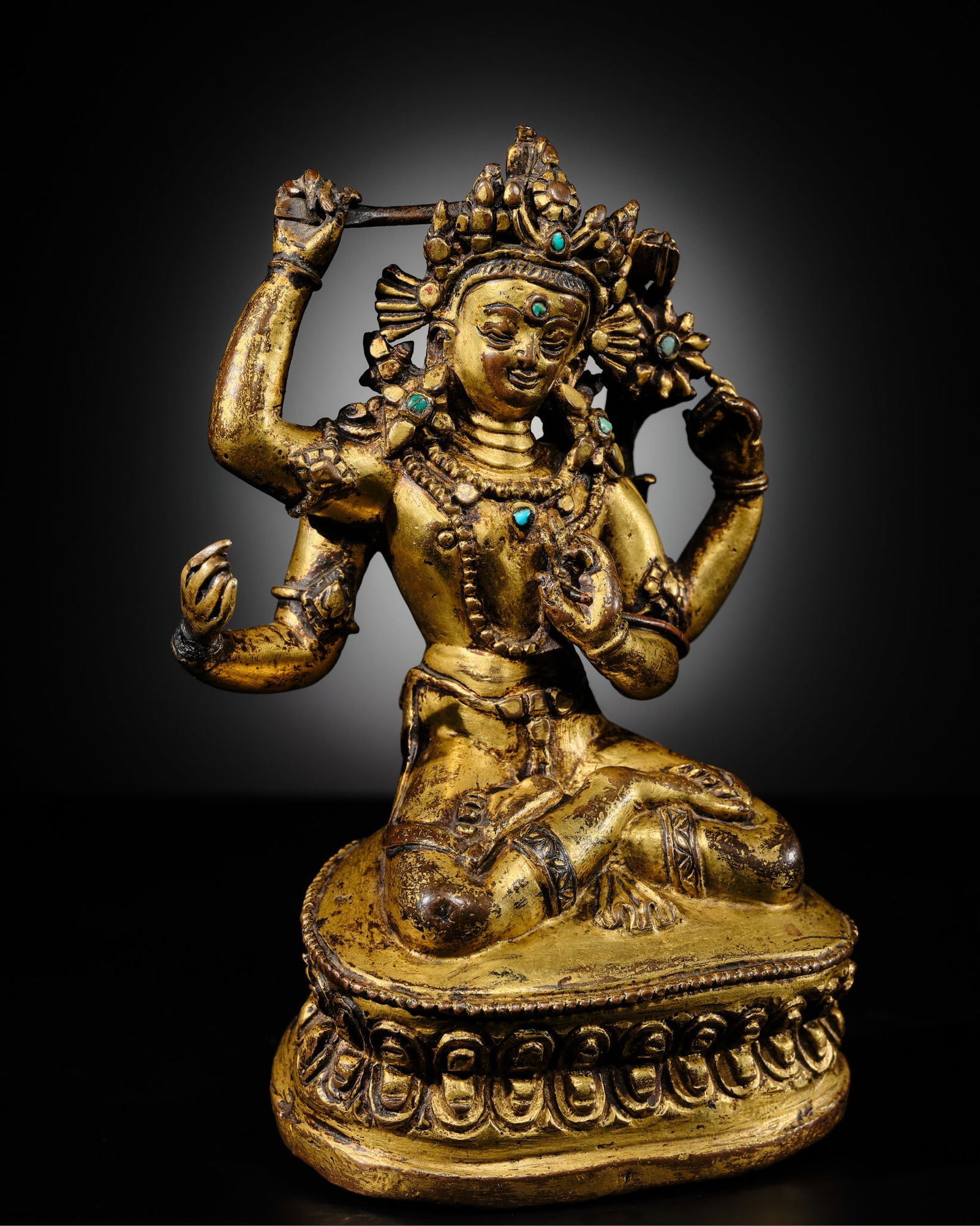 A RARE GILT-BRONZE FIGURE OF MANJUSHRI NAMASANGITI, NEPAL, 14TH-15TH CENTURY (1 of 13)