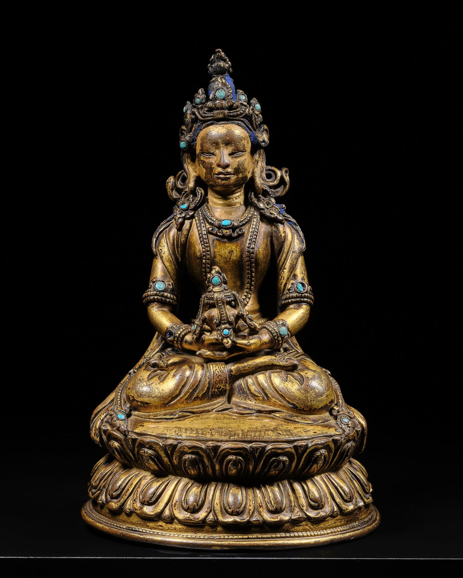A RICHLY GILT AND TURQUOISE-INLAID BRONZE FIGURE OF AMITAYUS, TIBET, 14TH CENTURY (1 of 13)