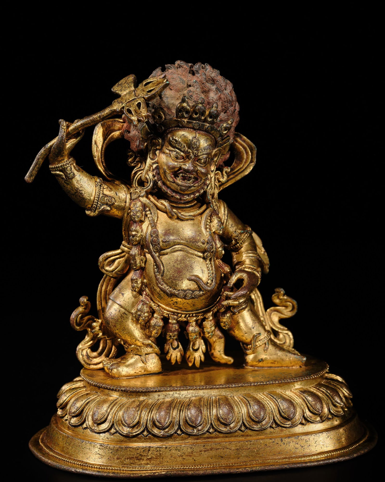A GILT-BRONZE FIGURE OF NILAMBARA VAJRAPANI, TIBET, 16TH-17TH CENTURY (1 of 12)