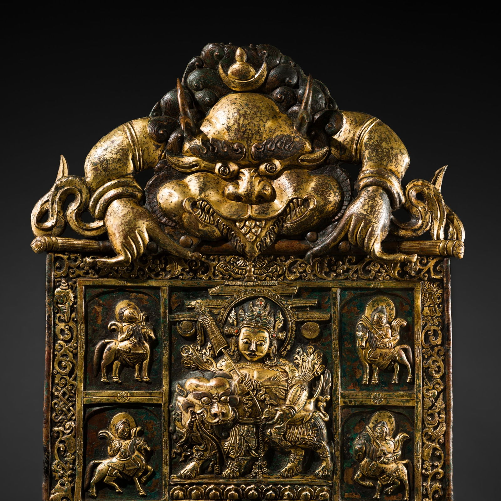 A LARGE (83 CM) GILT-COPPER REPOUSSÉ PANEL DEPICTING VAISHRAVANA AND HIS RETINUE OF SIX (1 of 20)