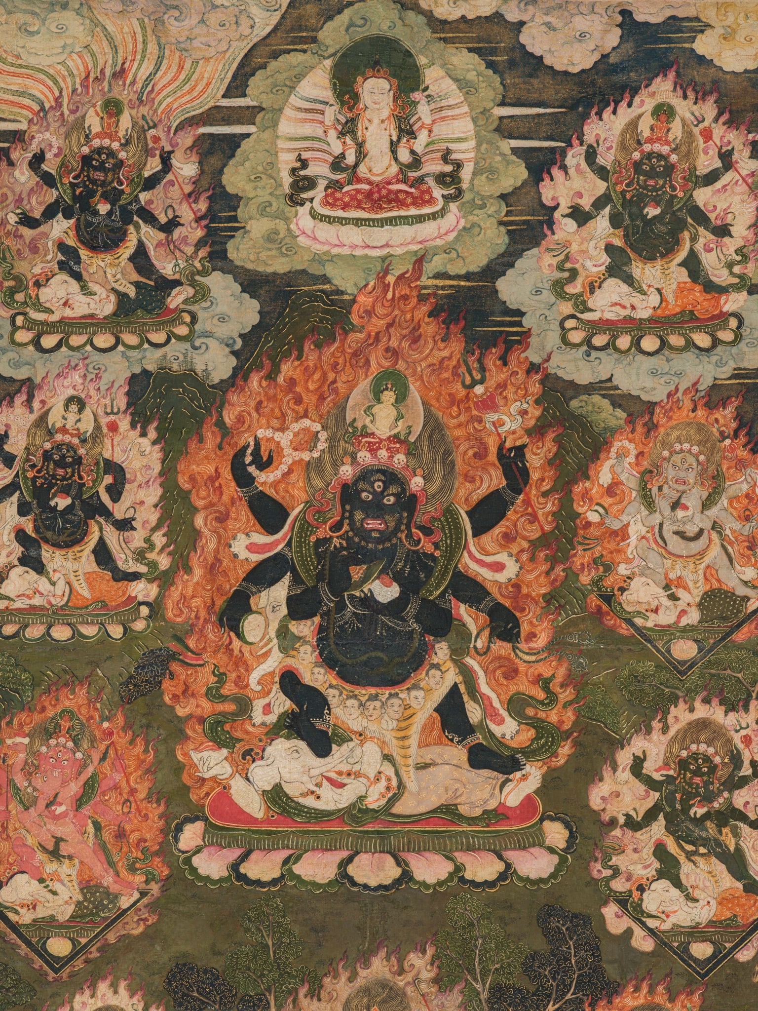 A FINE AND PARCEL-GILT THANGKA OF SHADBHUJA MAHAKALA, TIBETAN-CHINESE, 18TH CENTURY: A FINE AND PARCEL-GILT THANGKA OF SHADBHUJA MAHAKALA, TIBETAN-CHINESE, 18TH CENTURY Expert's note: The present thangka is of superb quality. It is minutely and meticulously executed, rich in detail, a