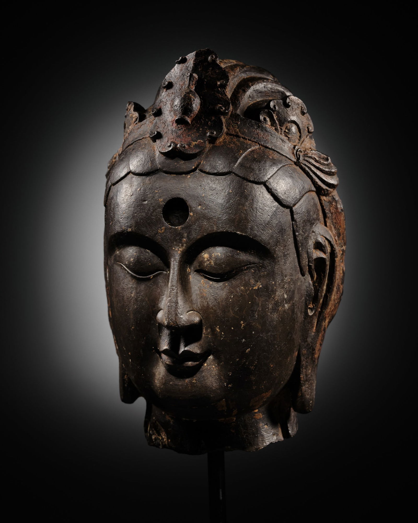 A FINE BLACK LIMESTONE HEAD OF THE BODHISATTVA OF WISDOM, DASHIZHI (MAHĀSTHĀMAPRĀ (1 of 16)