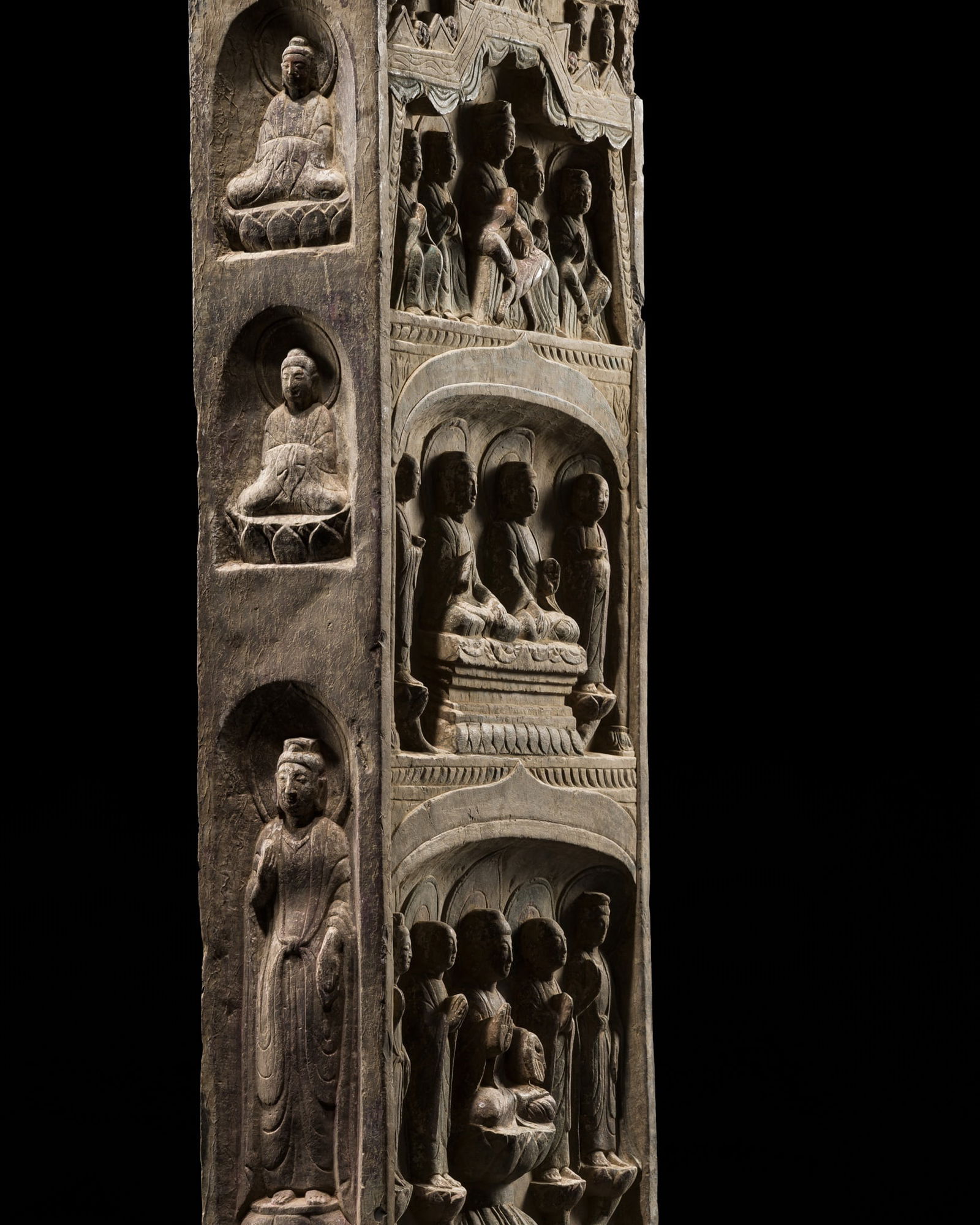 A LARGE FOUR-SIDED, INSCRIBED, AND PAINTED LIMESTONE STELE WITH MAITREYA AND SHAKYAMUNI, NORTHERN QI (1 of 20)